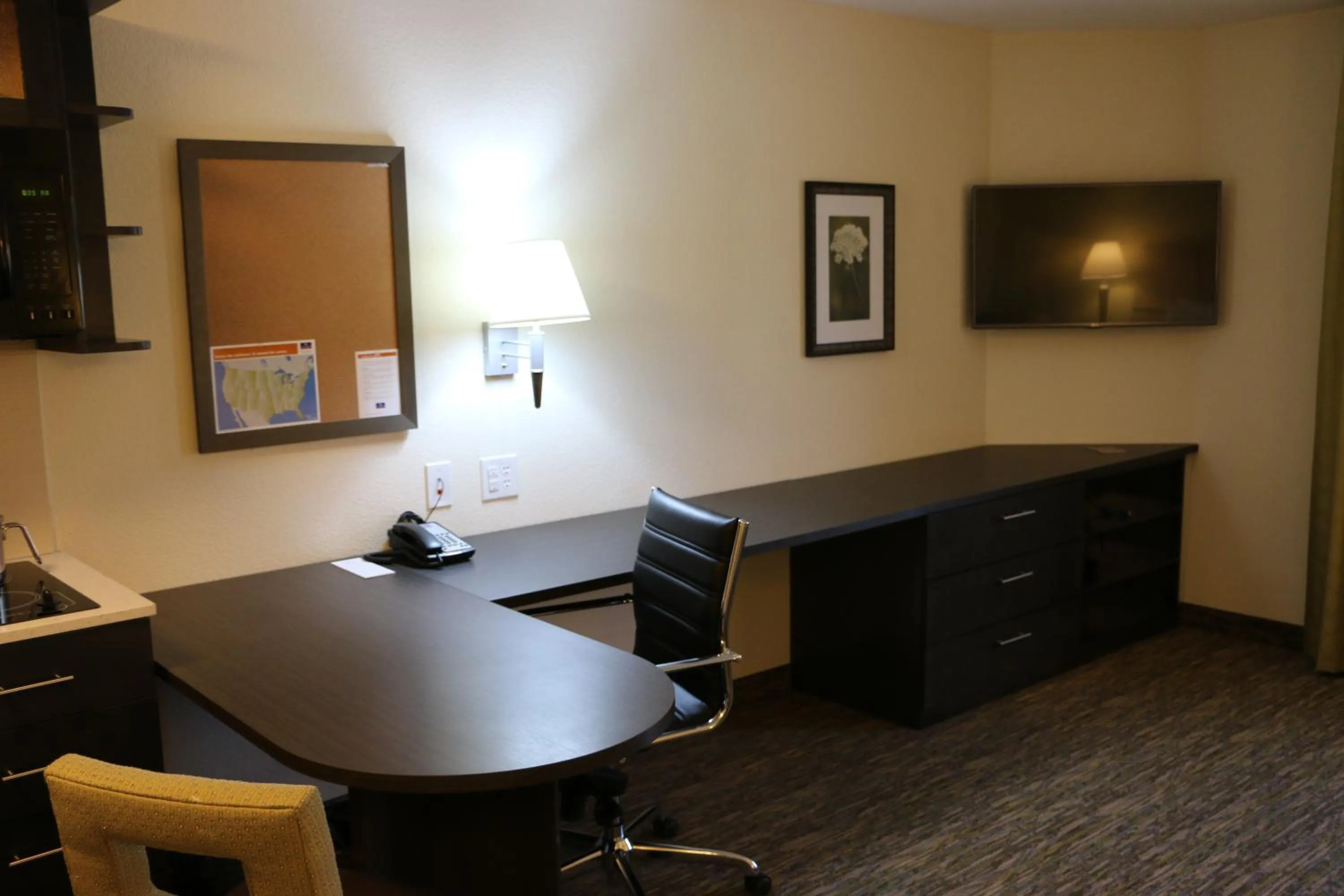 Seating area in Candlewood Suites Bloomington by IHG