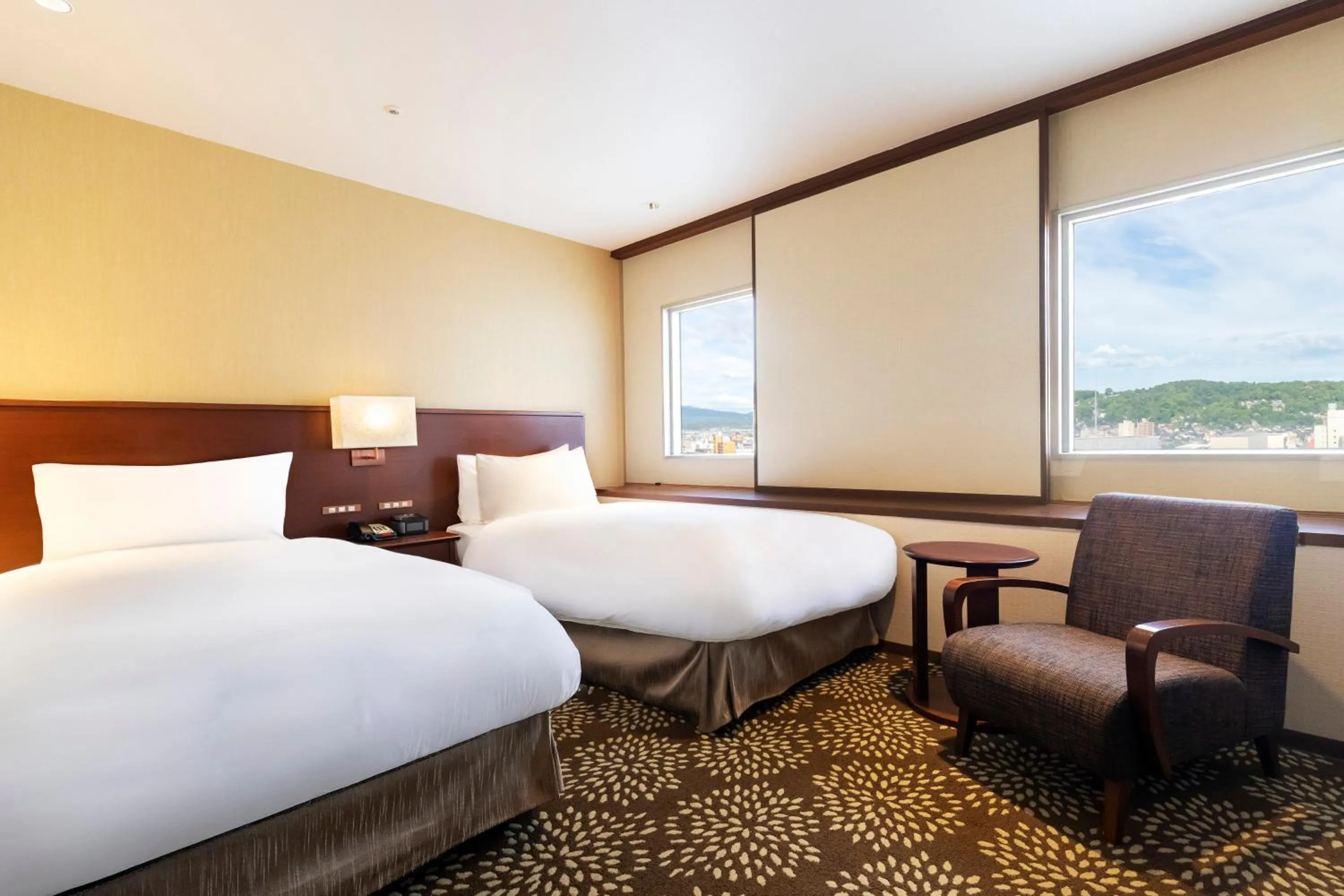Photo of the whole room, Bed in ANA Holiday Inn Kanazawa Sky by IHG