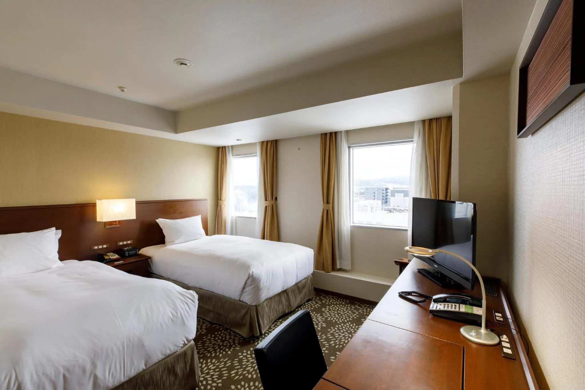 Photo of the whole room, Bed in ANA Holiday Inn Kanazawa Sky by IHG