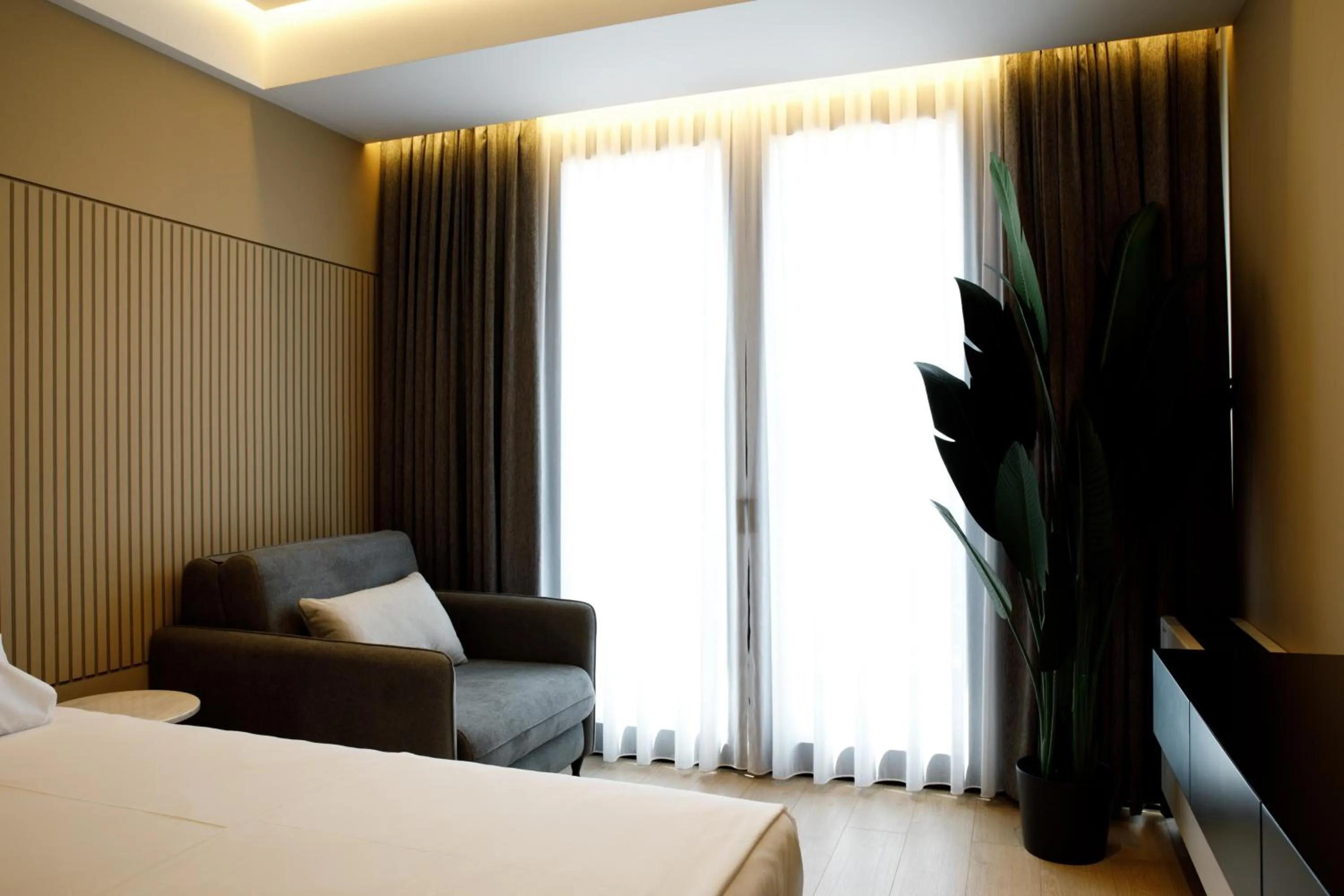 Bedroom, Bed in Caramel Boutique Hotel