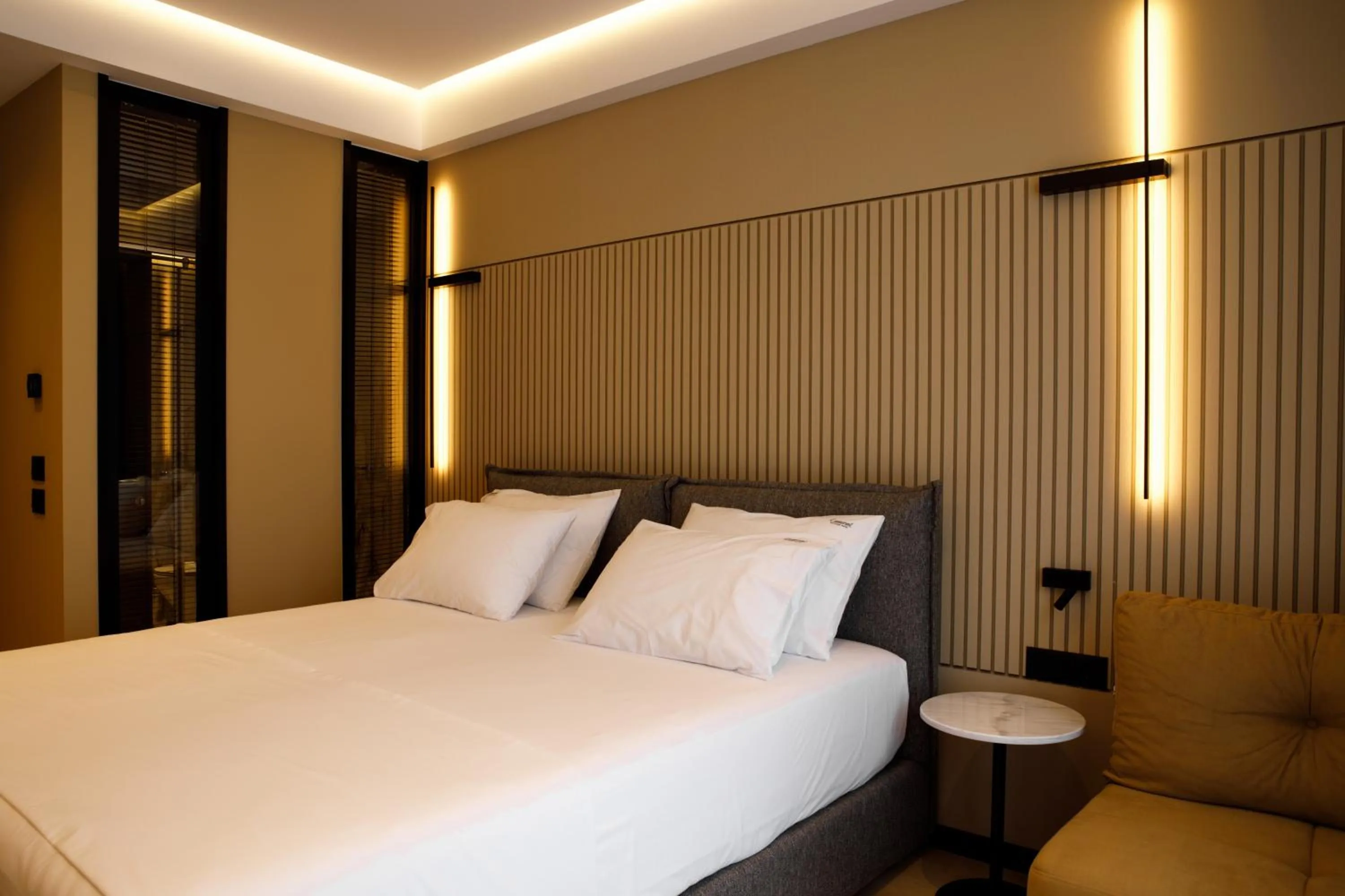 Bedroom, Bed in Caramel Boutique Hotel