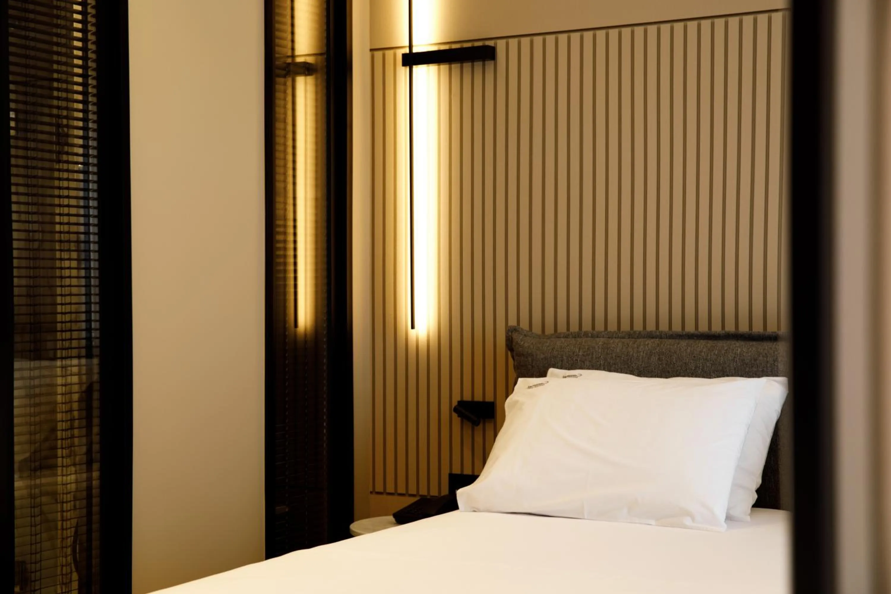 Decorative detail, Bed in Caramel Boutique Hotel