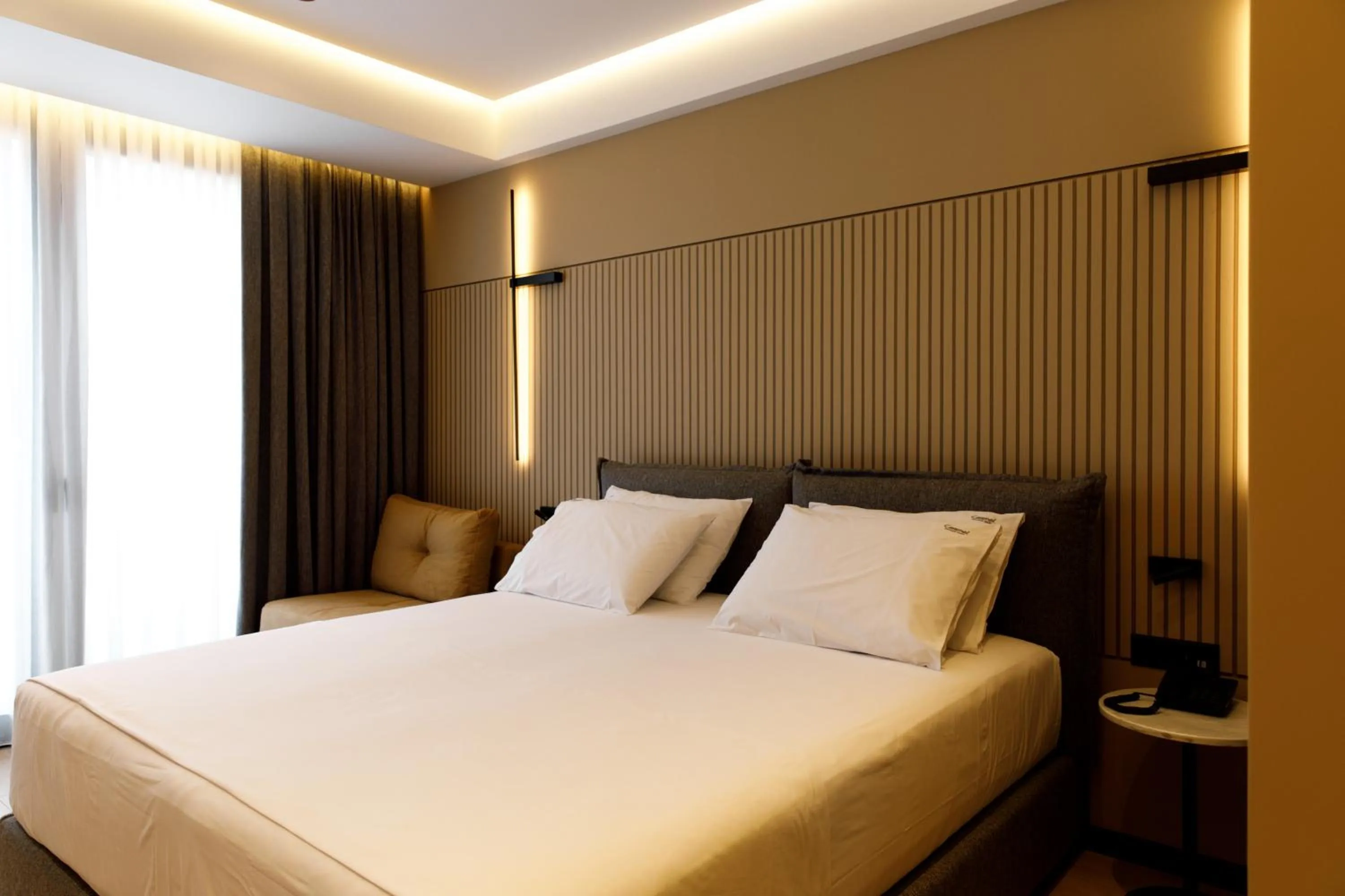 Bedroom, Bed in Caramel Boutique Hotel