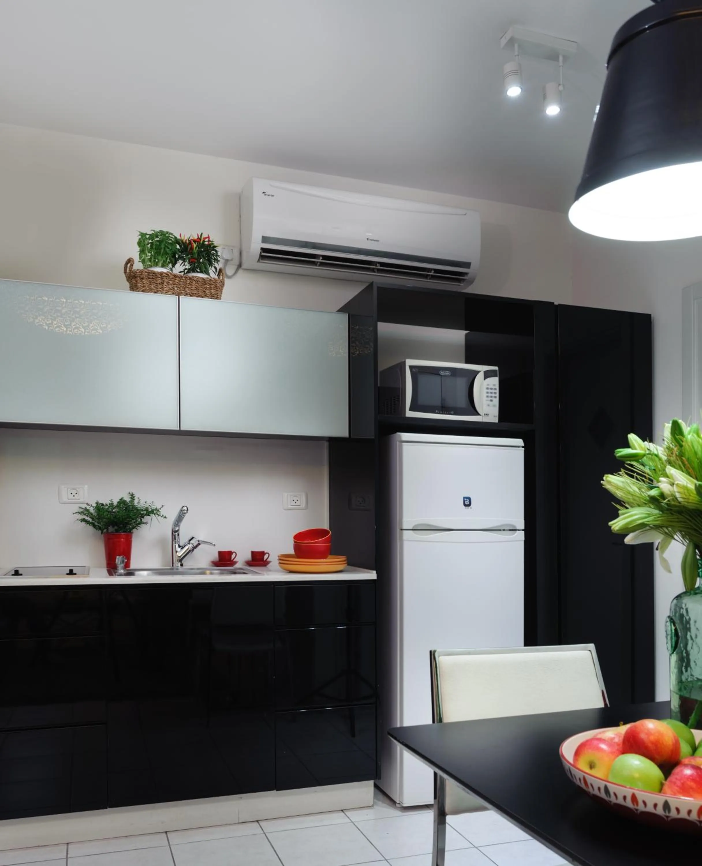 Kitchen or kitchenette in Rafael Residence Boutique