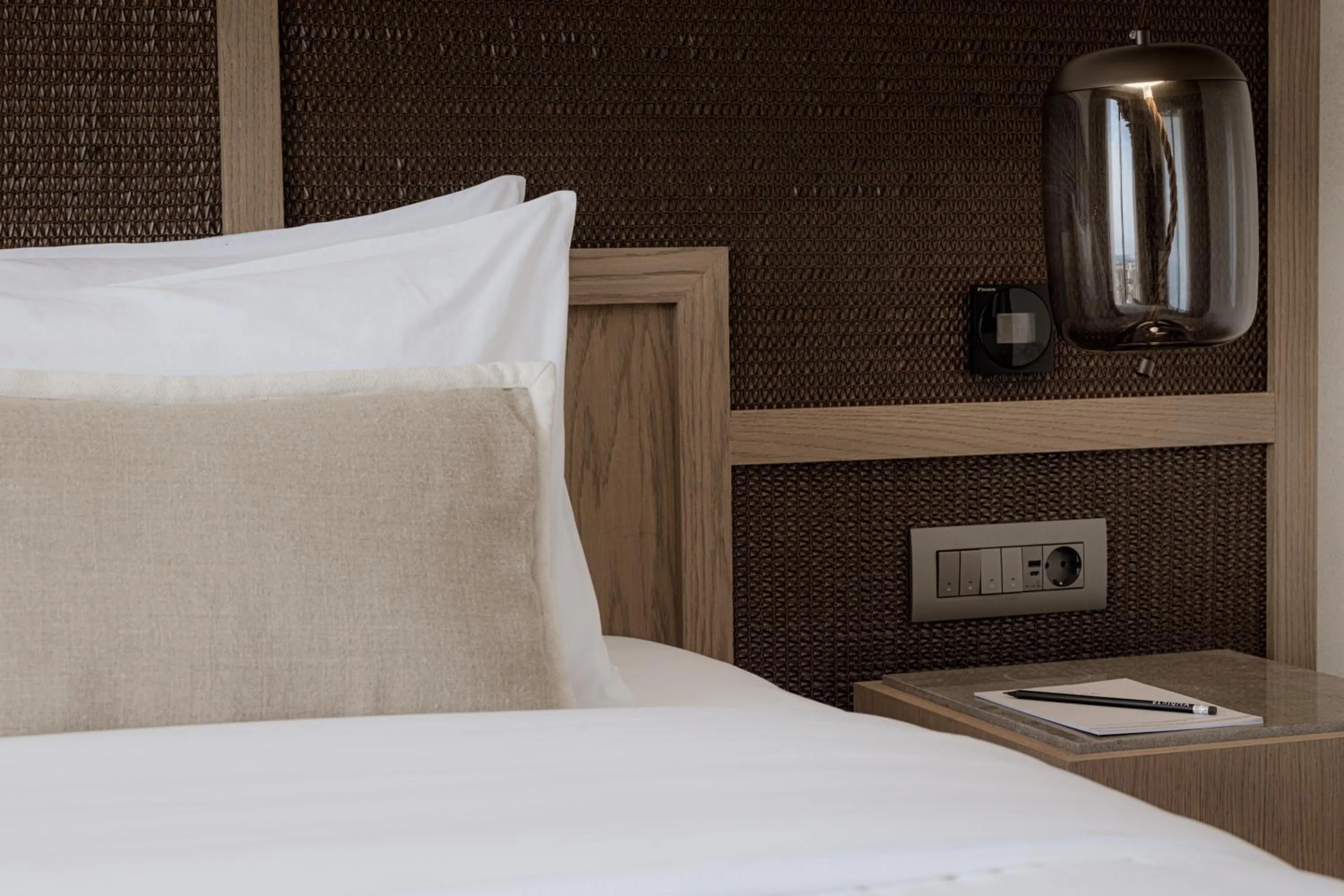 Bed in Enigma Mykonos Hideaway Suites