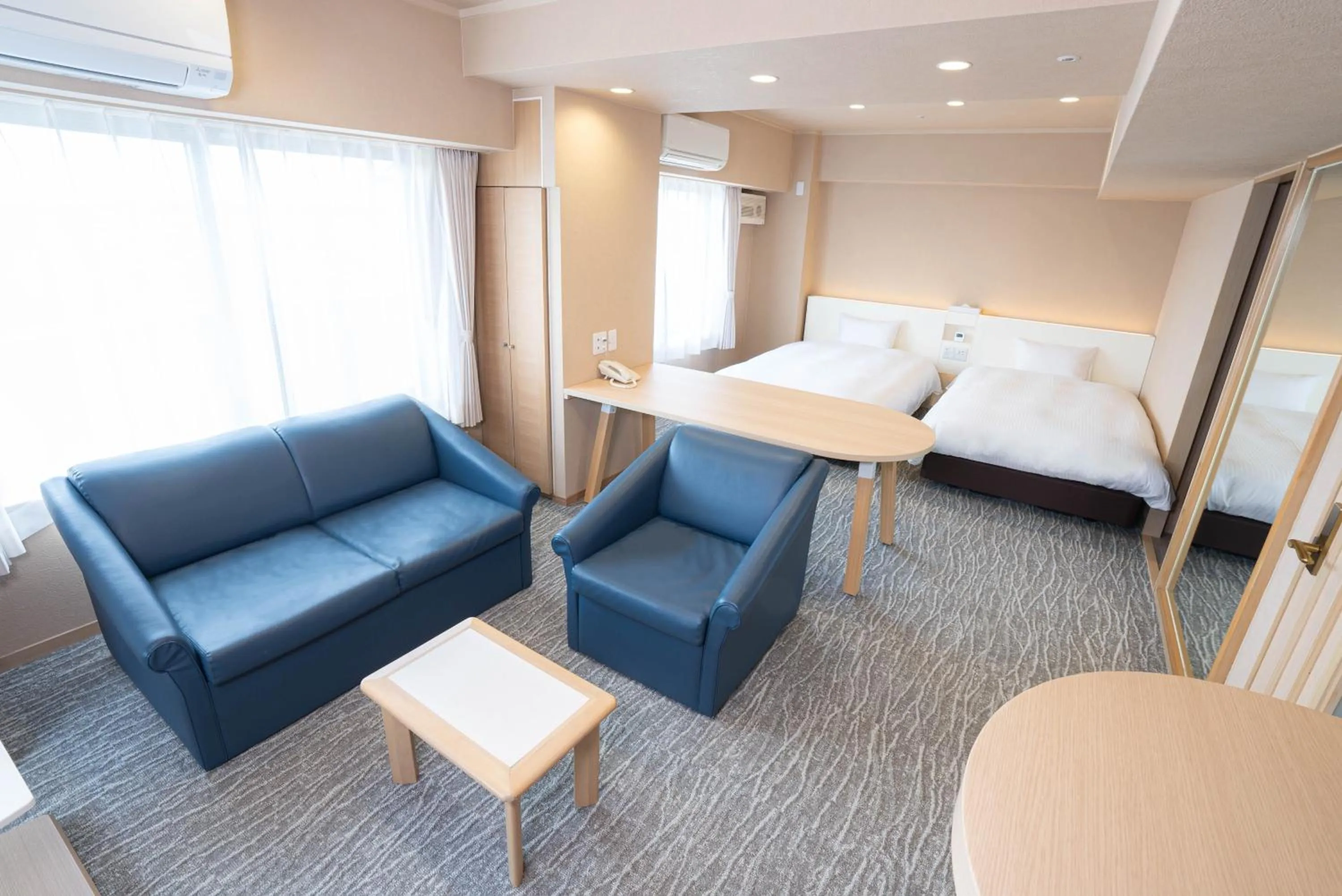 Bed in Hotel Alpha Inn Akita