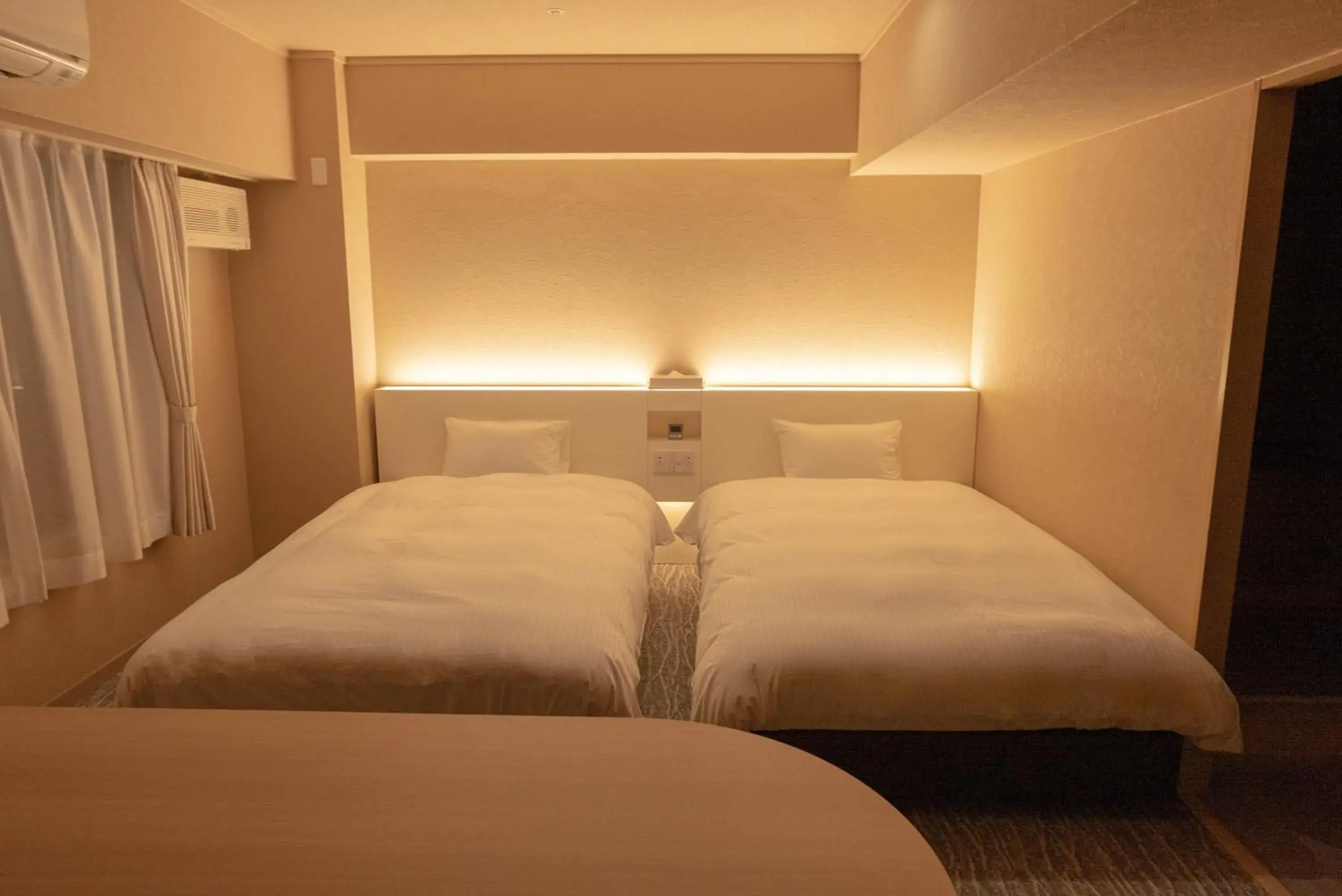 Bed in Hotel Alpha Inn Akita Bed in Hotel Alpha Inn Akita