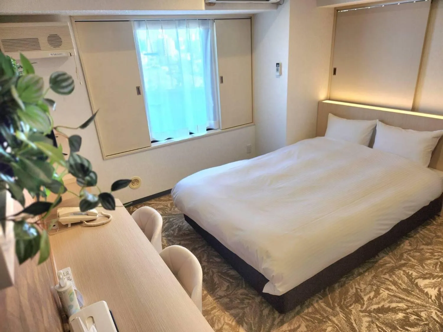 Bed in Hotel Alpha Inn Akita