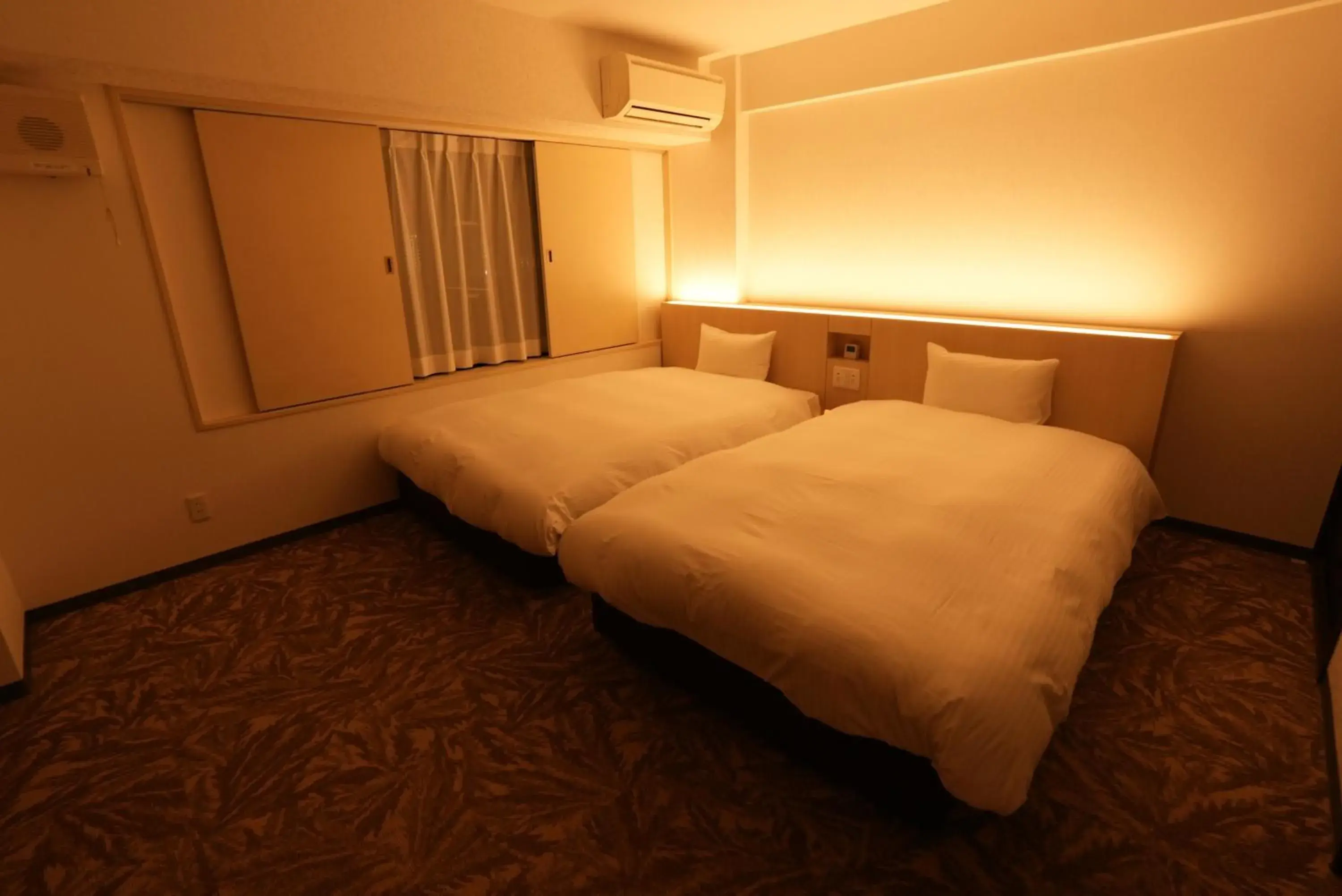 Bed in Hotel Alpha Inn Akita Bed in Hotel Alpha Inn Akita