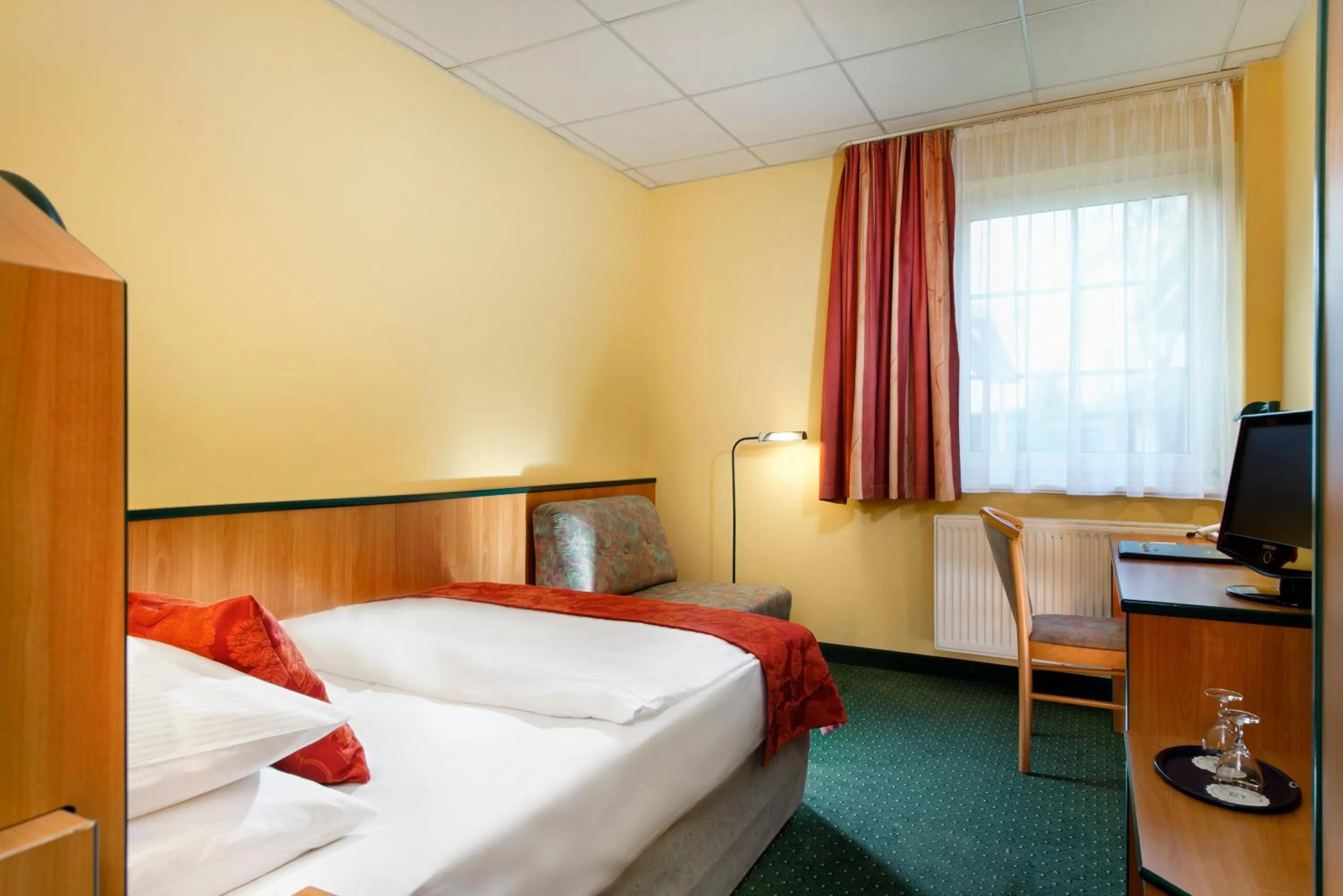 Photo of the whole room, Bed in Hotel Landhaus Dierkow