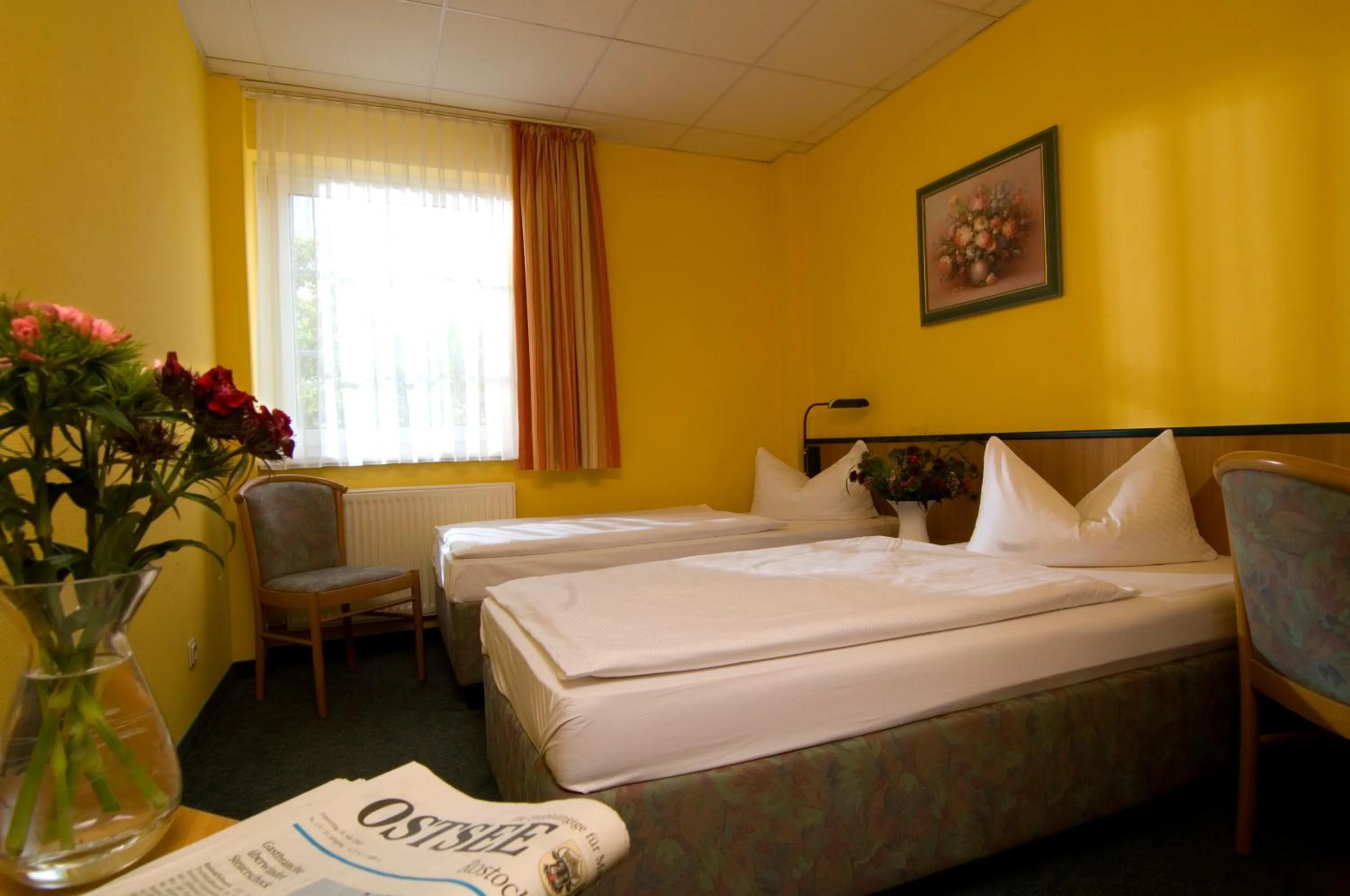 Photo of the whole room, Bed in Hotel Landhaus Dierkow