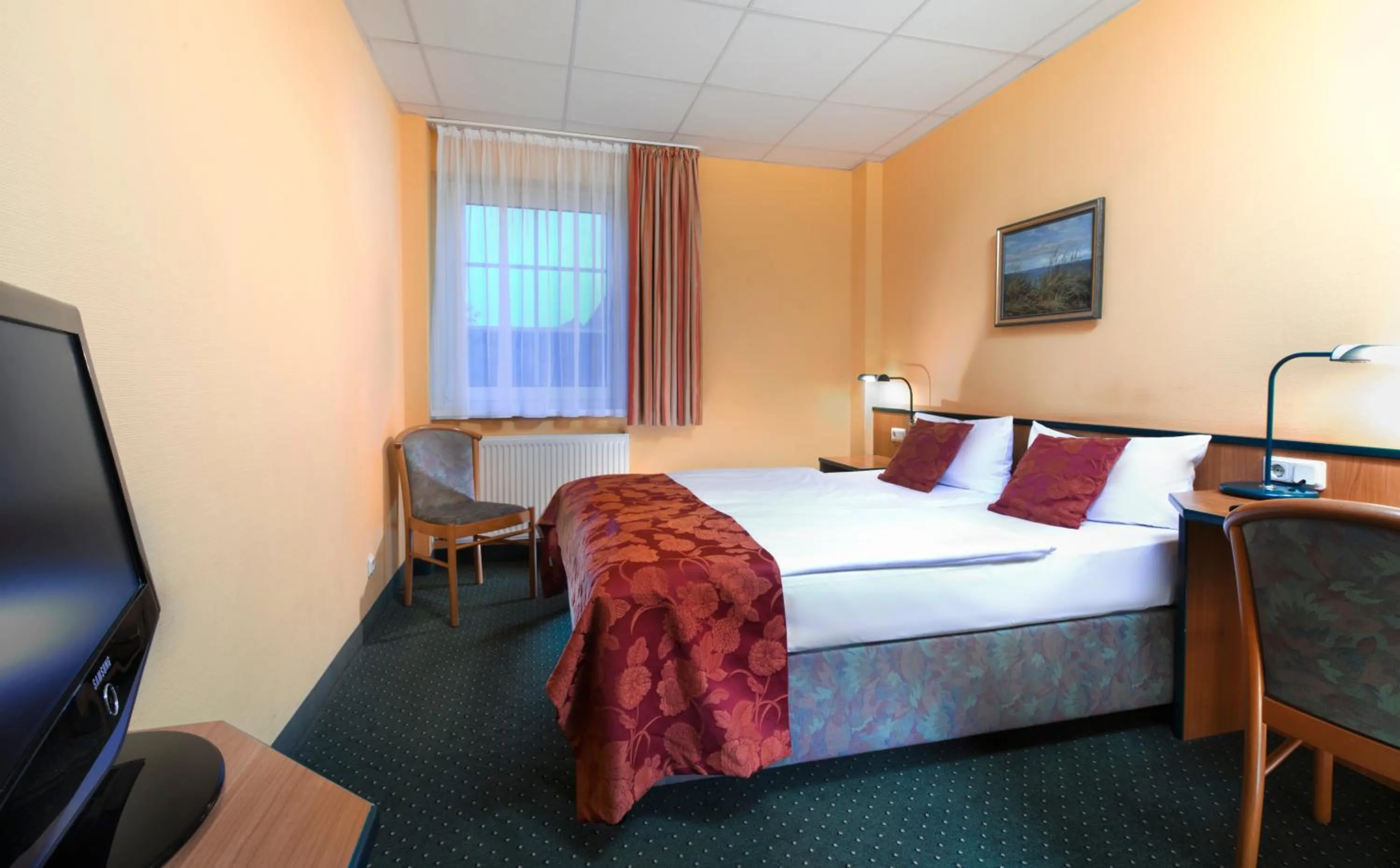 Photo of the whole room, Bed in Hotel Landhaus Dierkow