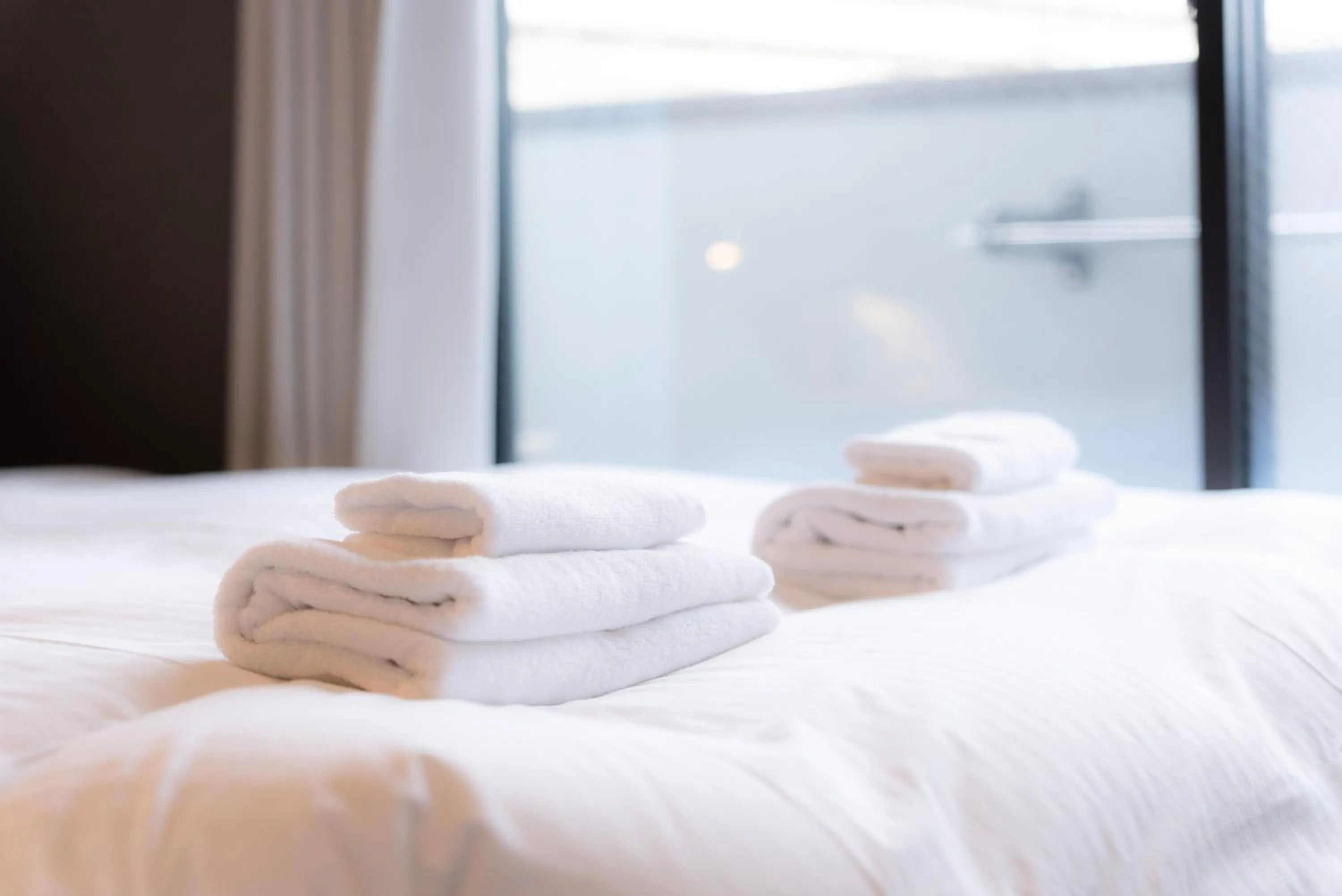 Photo of the whole room, Bed in WELLSTAY Osaka Shinimamiya Station