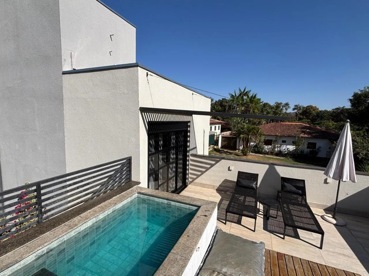 Pool view in Confraria da Prata Flats