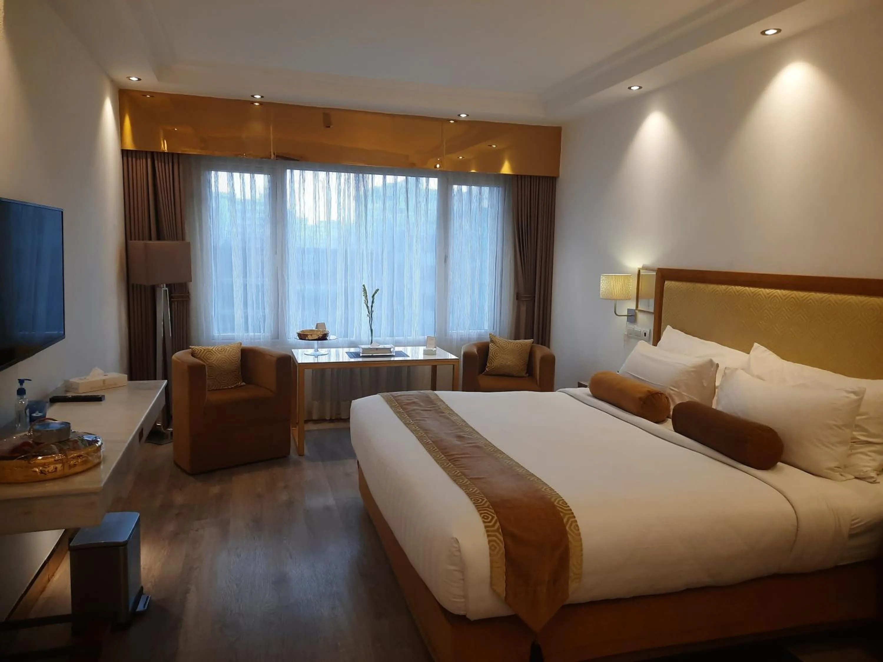 Bed in Hotel Razmoni Isha Kha International