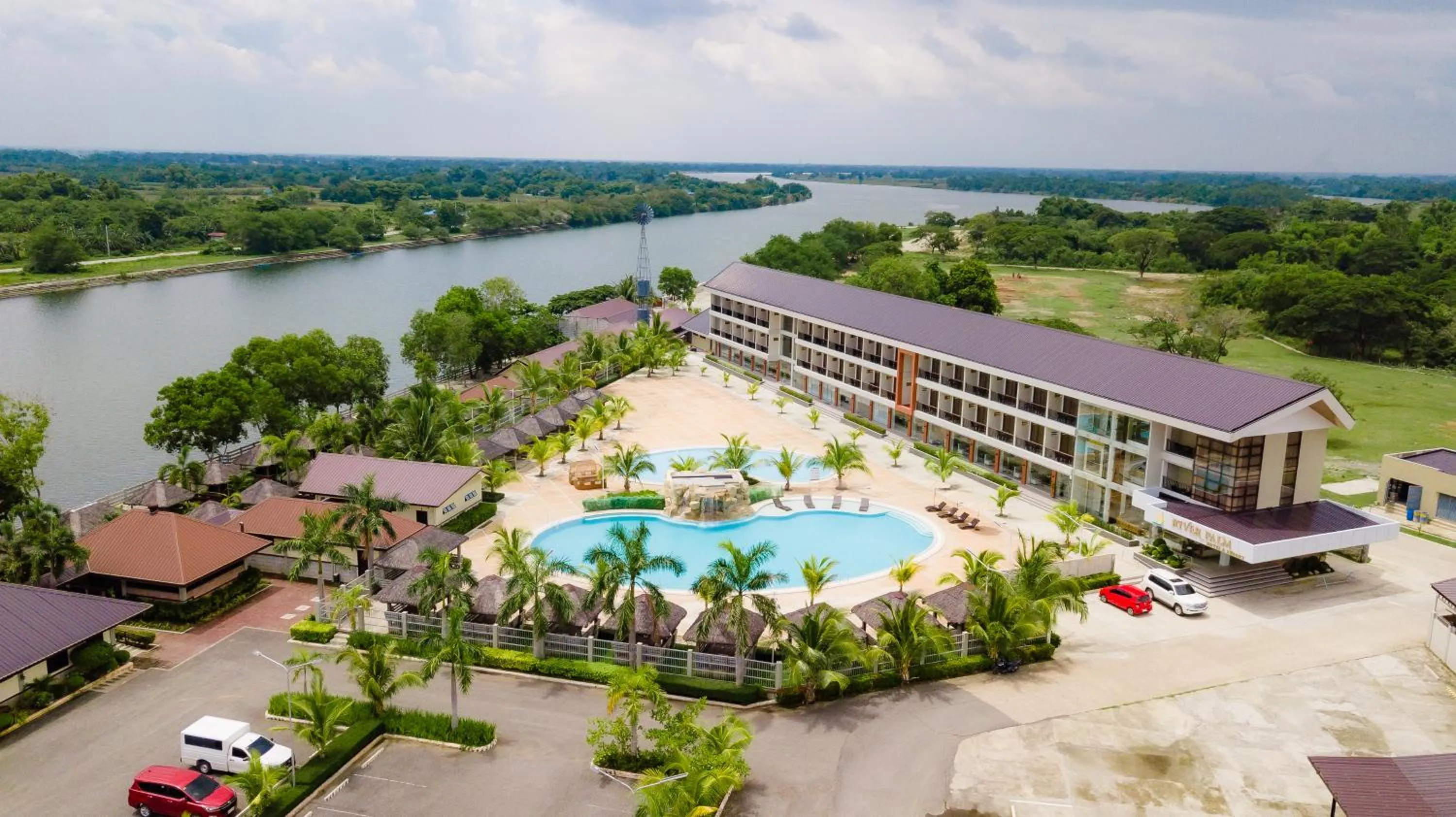 Property building in River Palm Hotel and Resort powered by Cocotel