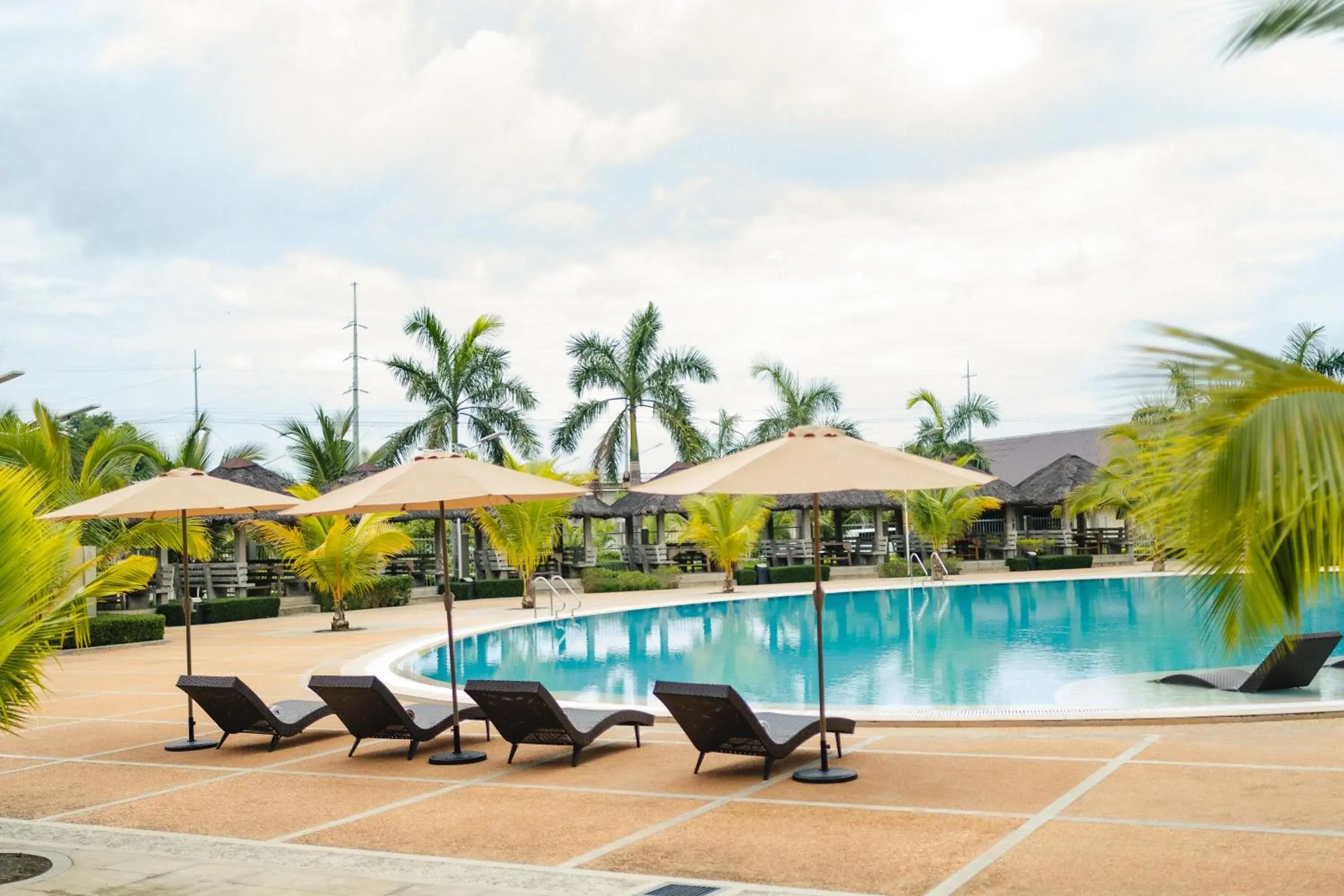 Swimming pool in River Palm Hotel and Resort powered by Cocotel Swimming pool in River Palm Hotel and Resort powered by Cocotel