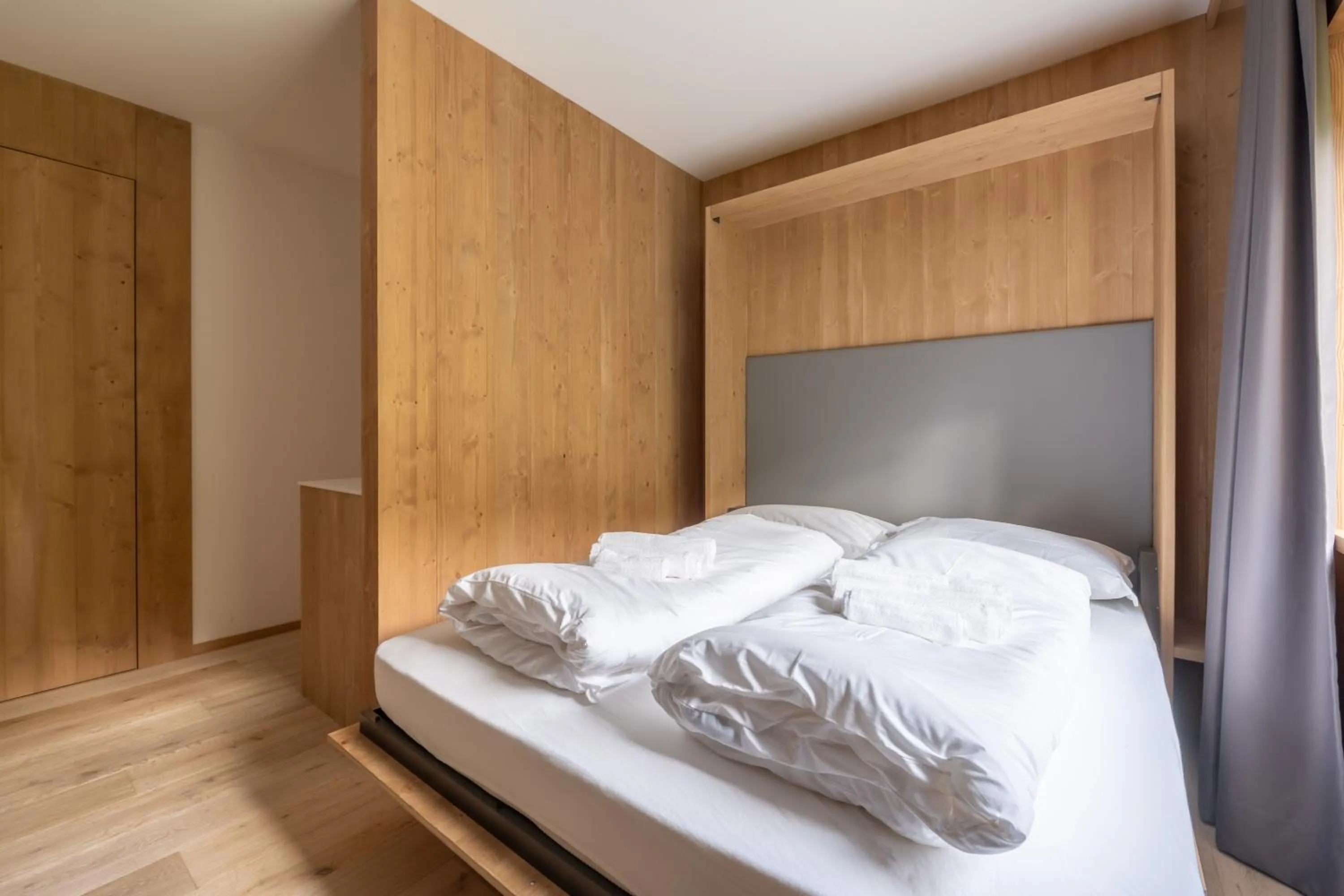 Bed in Ama Dolomiti - Residence