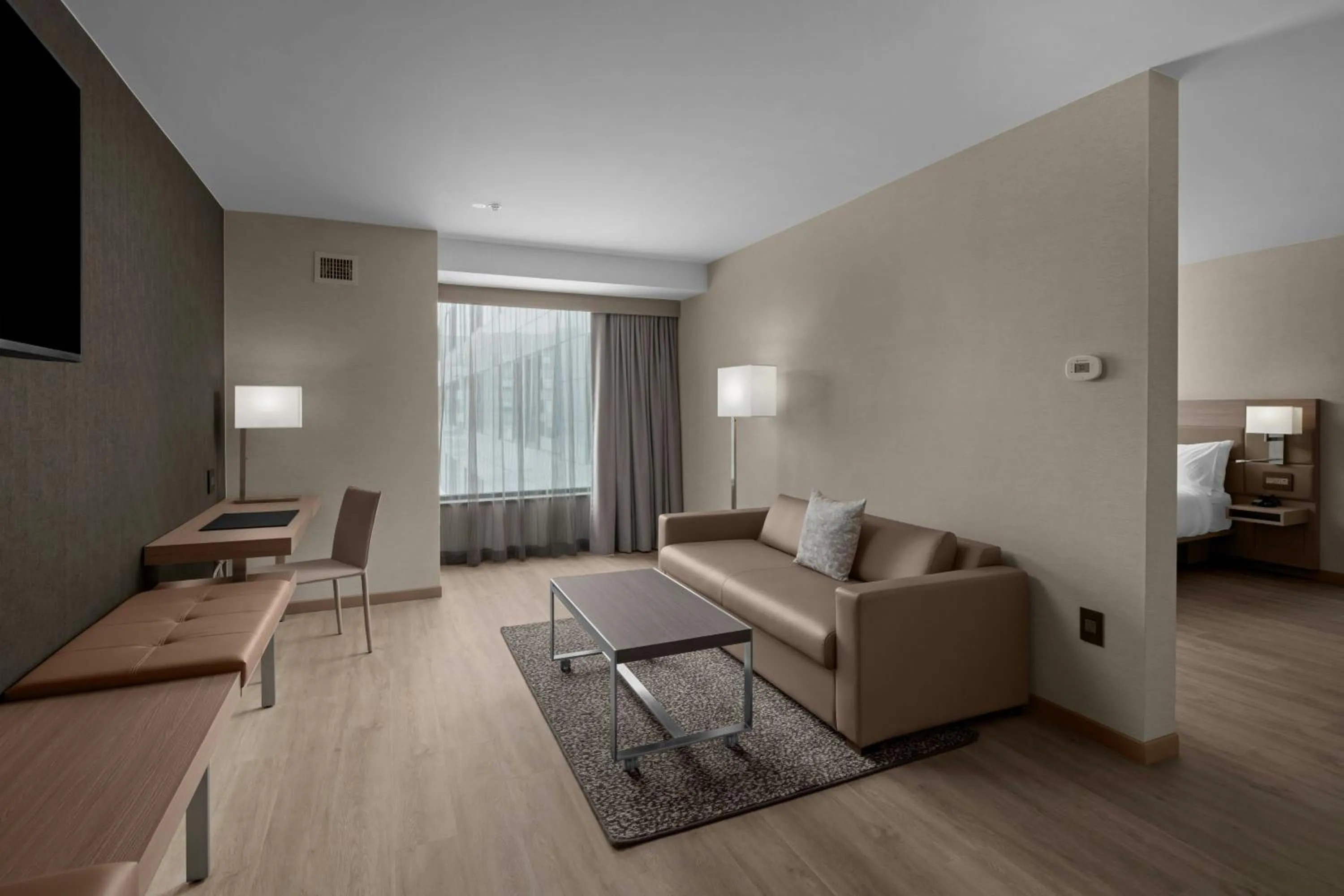 Living room in AC Hotel by Marriott Lansing University Area