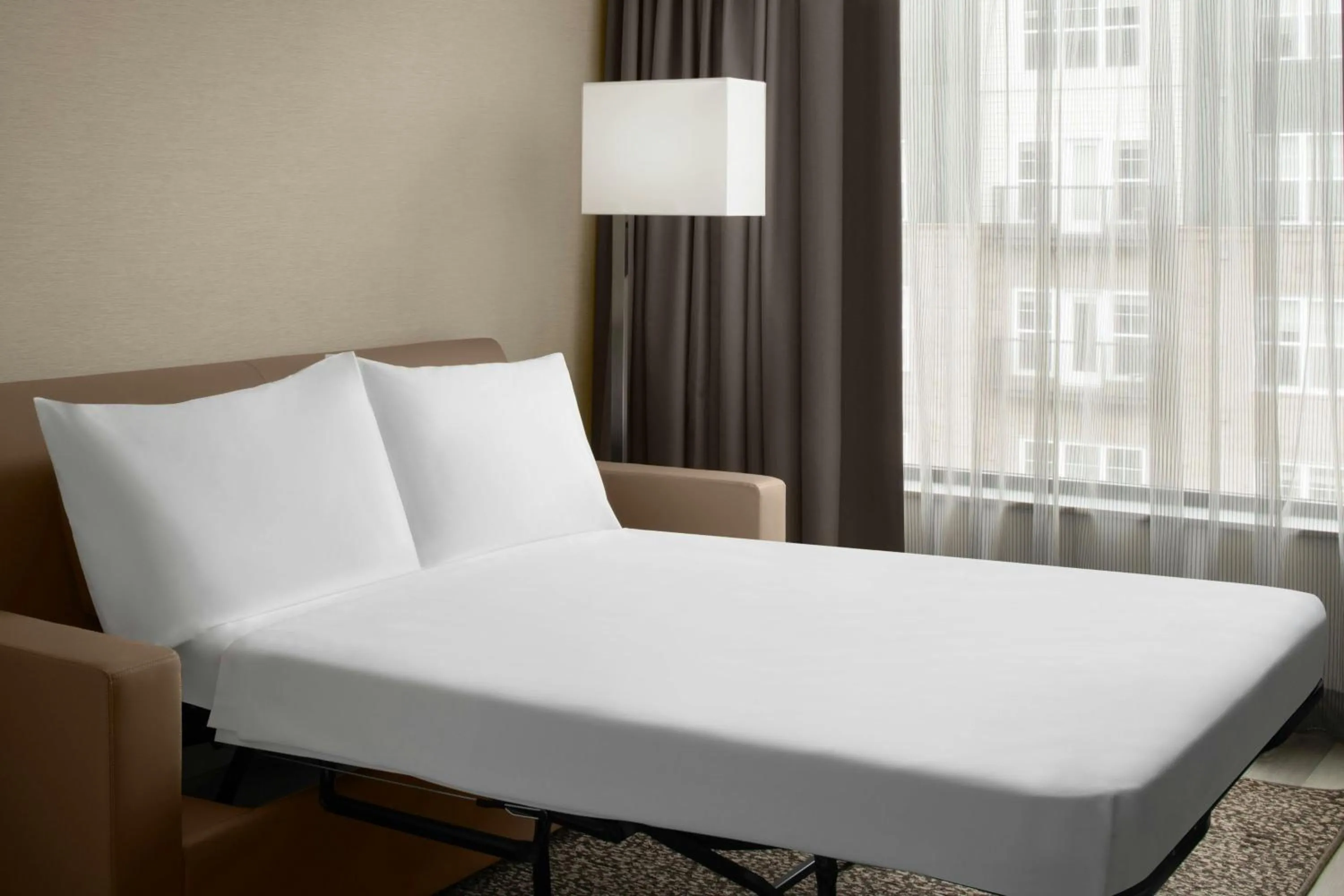 Photo of the whole room, Bed in AC Hotel by Marriott Lansing University Area