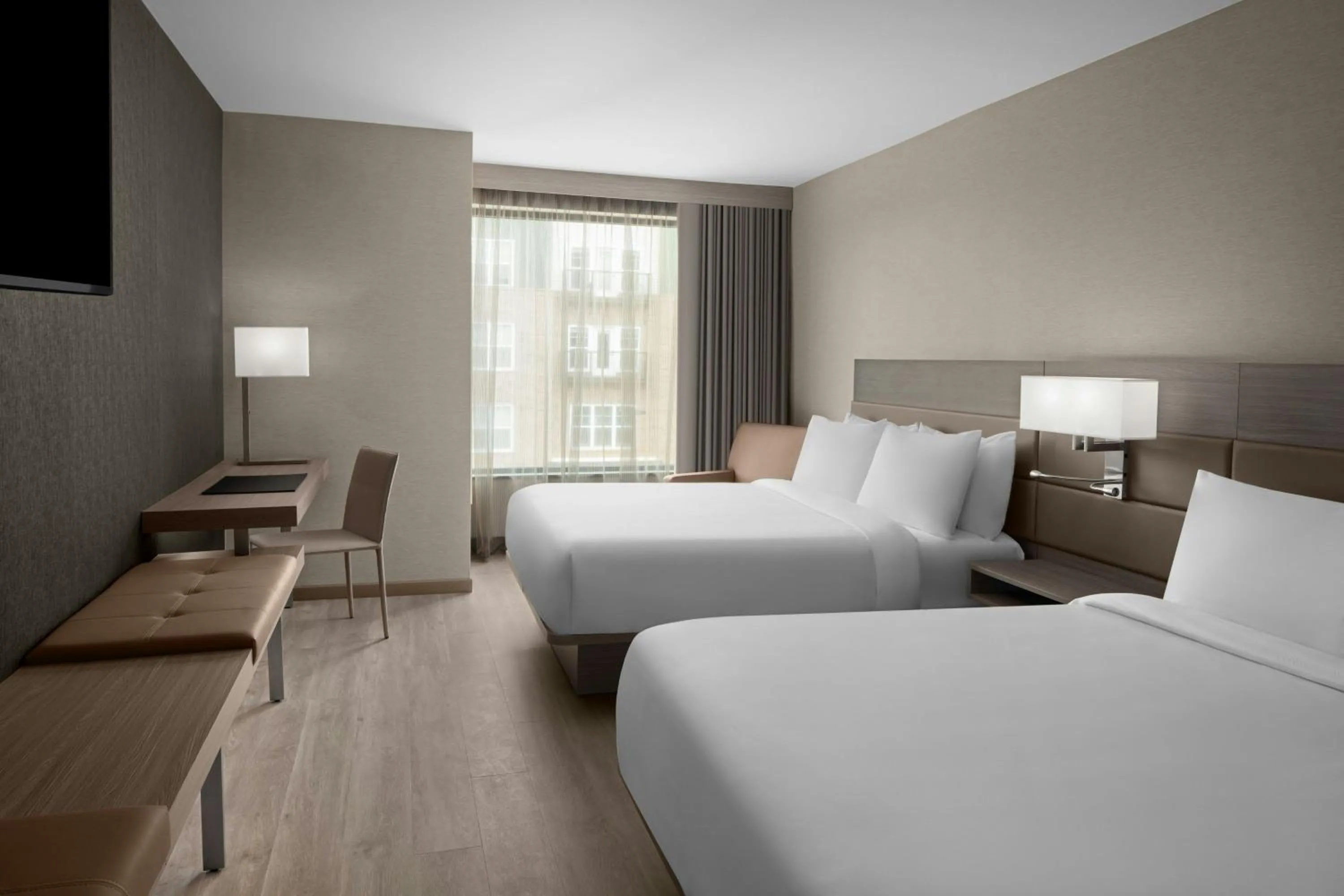 Photo of the whole room, Bed in AC Hotel by Marriott Lansing University Area