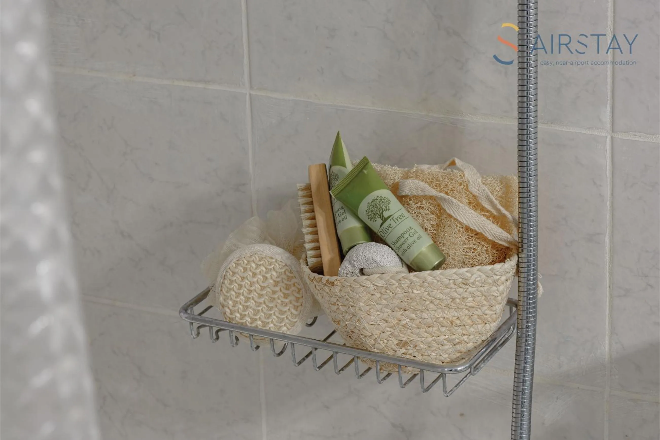 Bathroom in Zilean Apartments Airport by Airstay