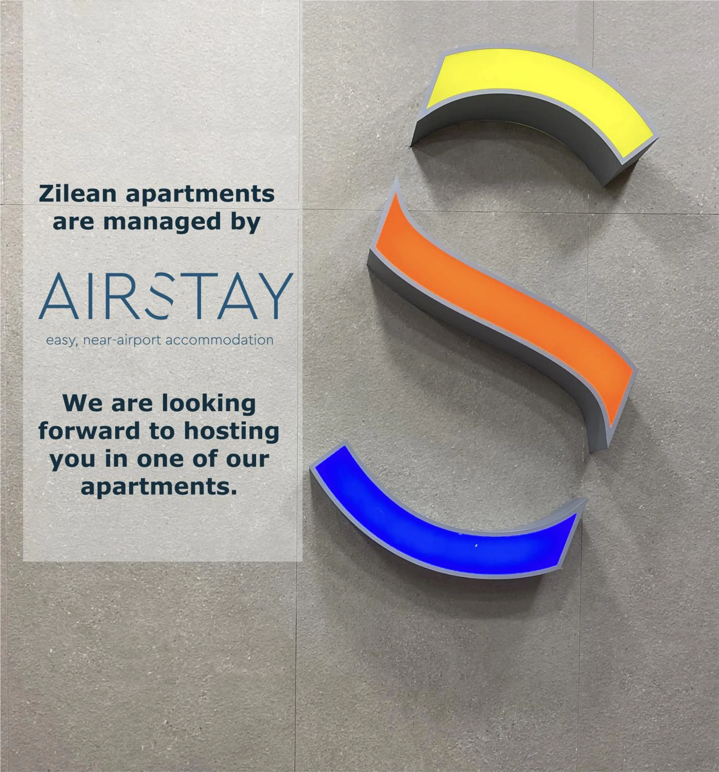 Property logo or sign in Zilean Apartments Airport by Airstay
