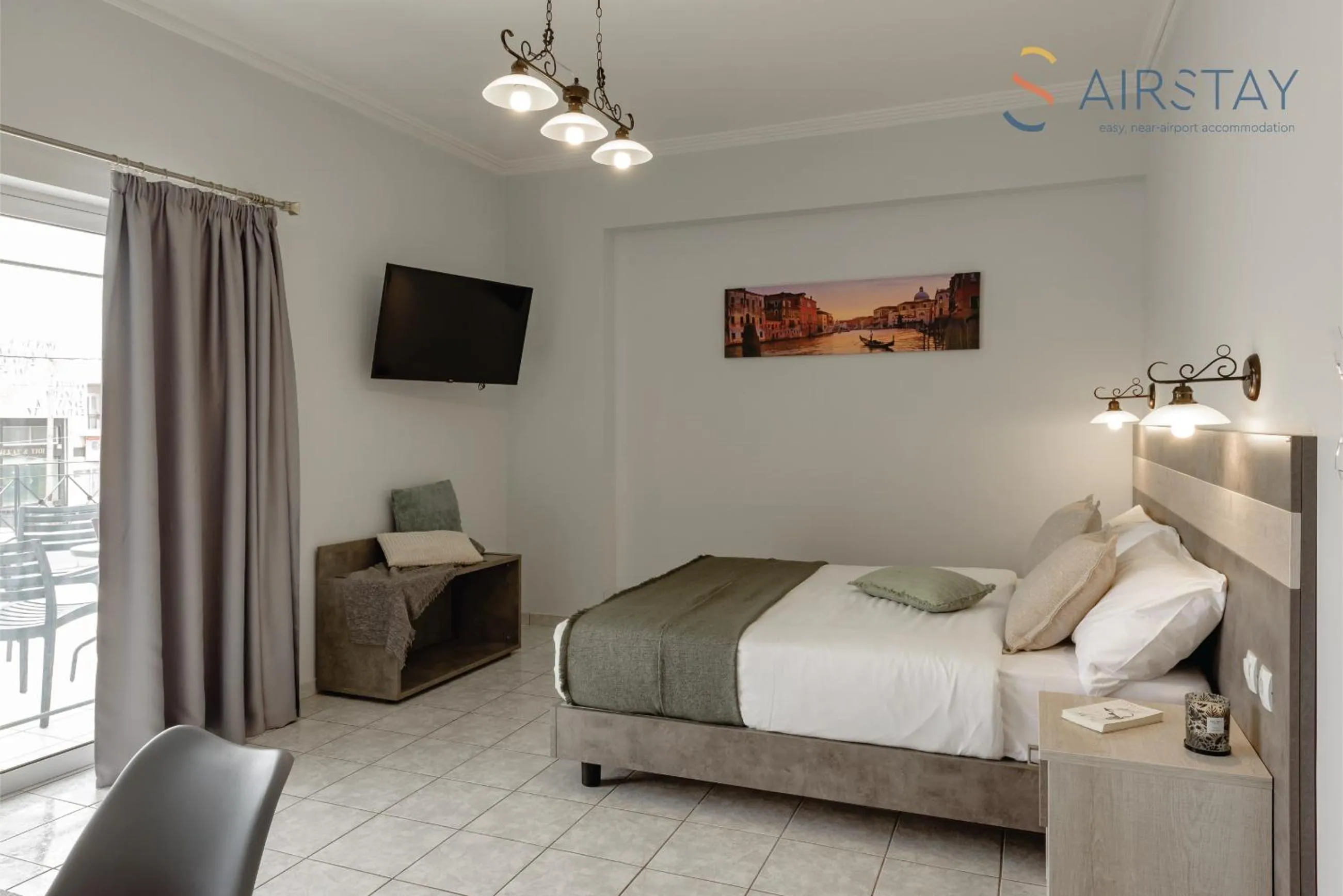 TV and multimedia, Bed in Zilean Apartments Airport by Airstay