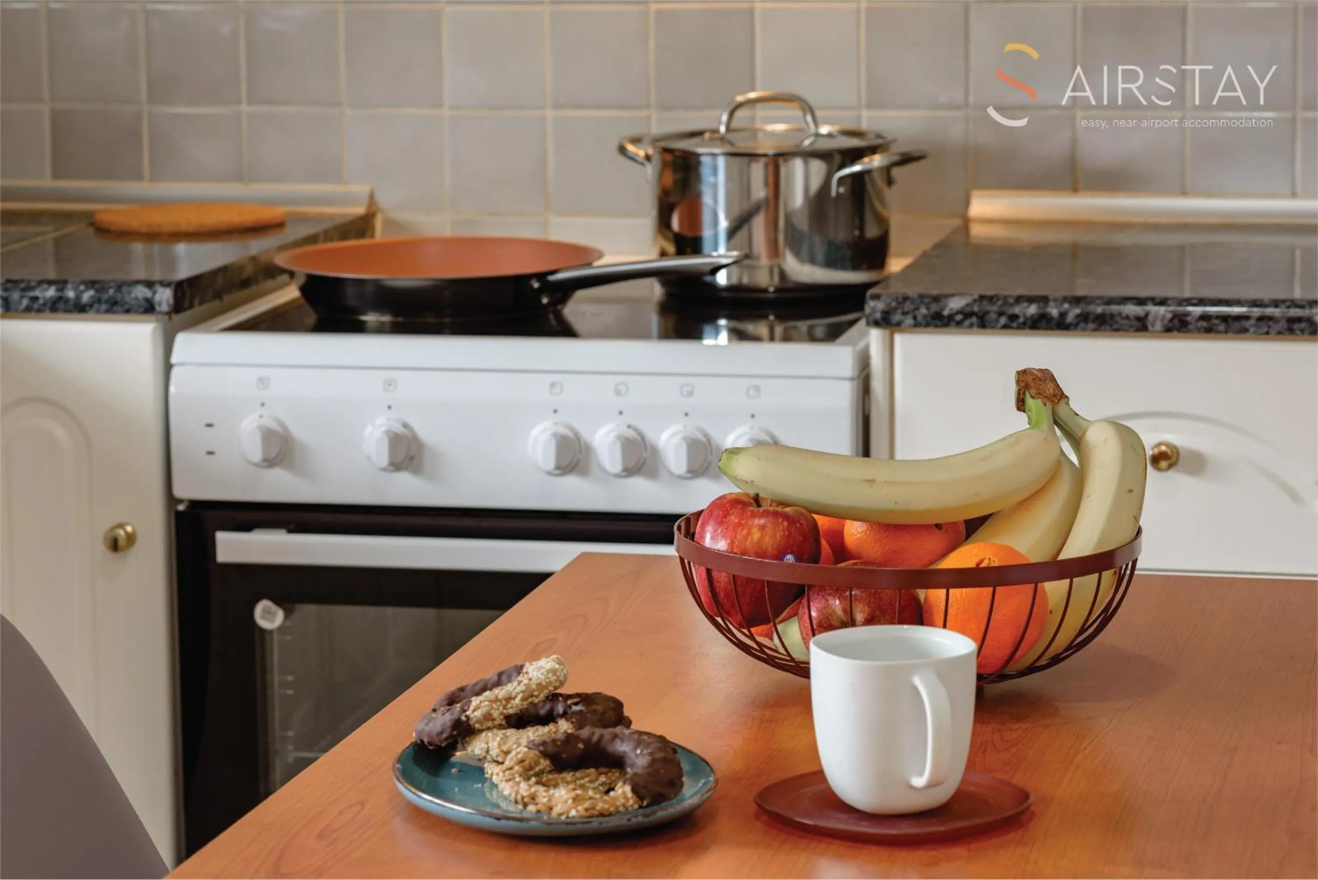 kitchen in Zilean Apartments Airport by Airstay