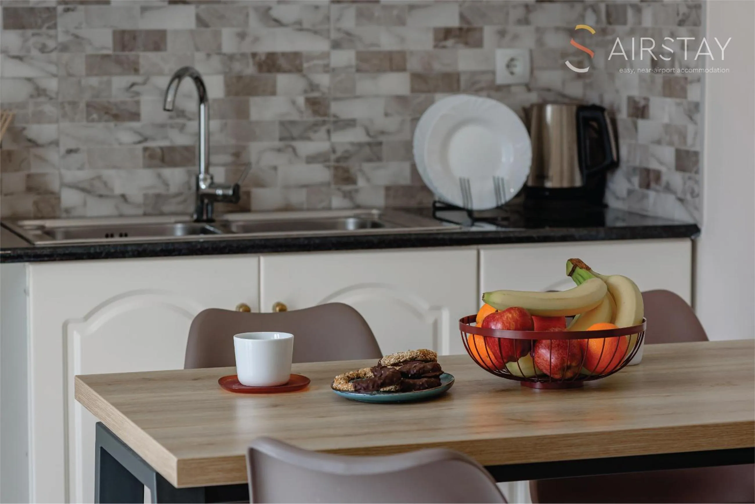 kitchen in Zilean Apartments Airport by Airstay
