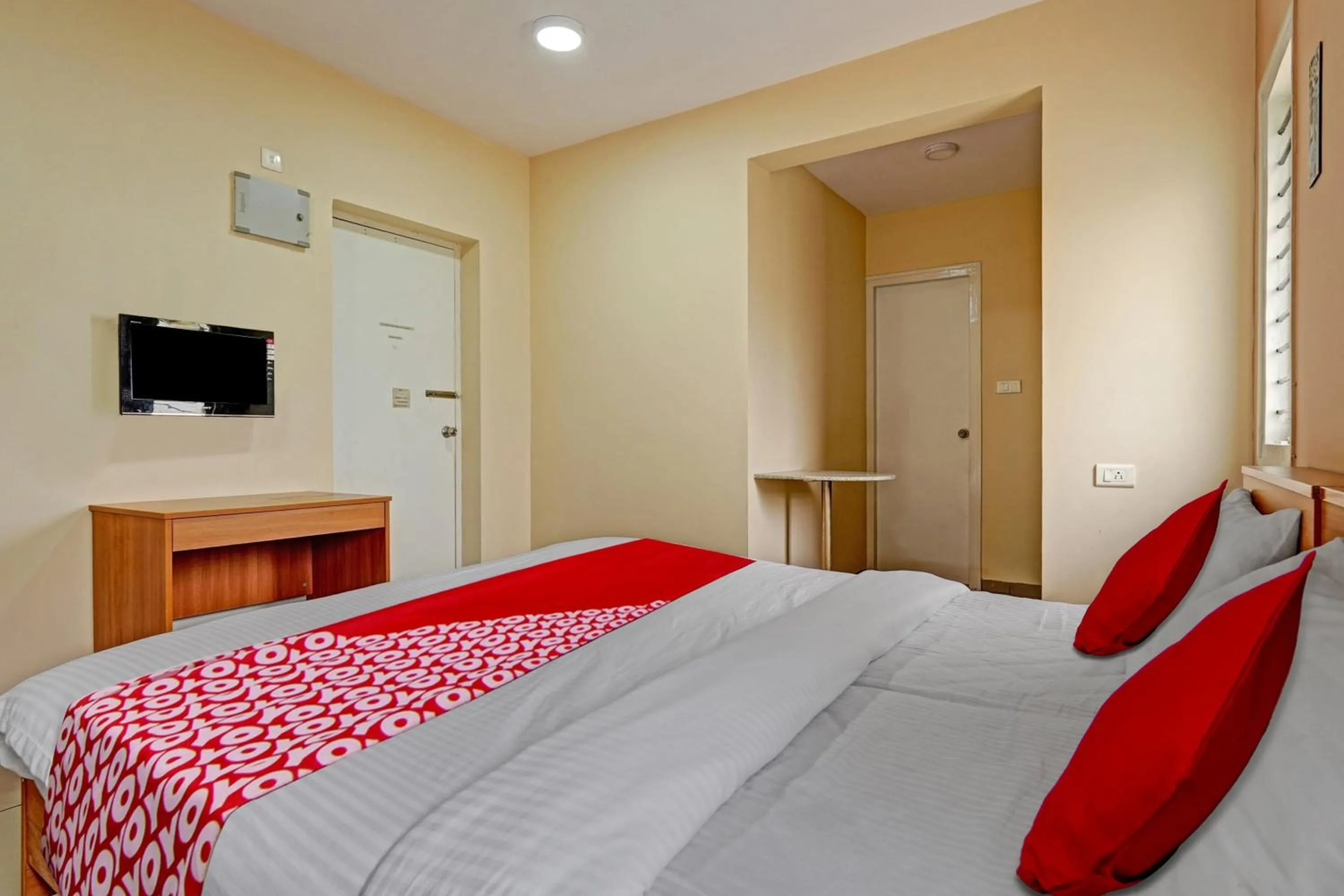 Bedroom, Bed in Hotel O Indra Suites