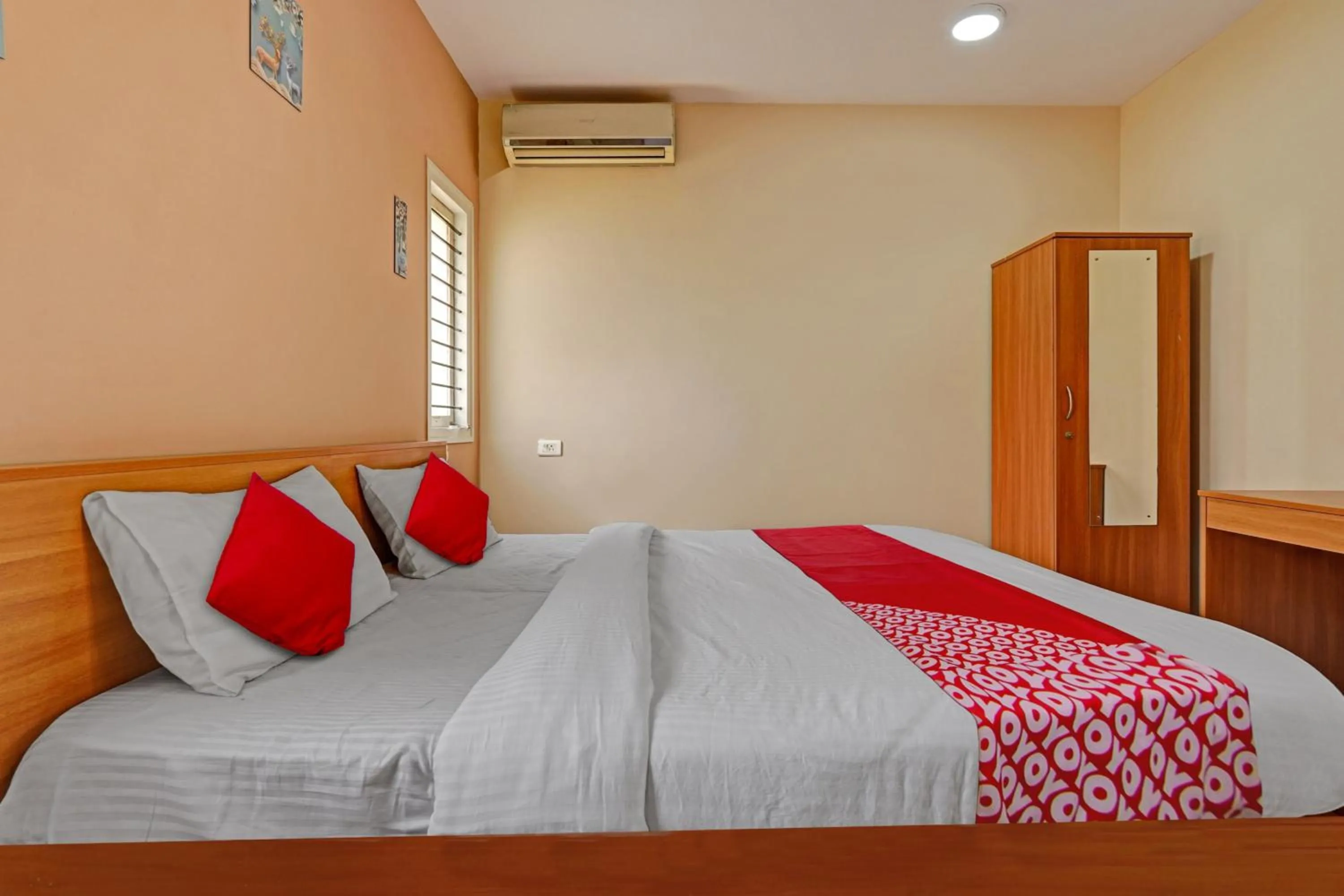 Bedroom, Bed in Hotel O Indra Suites