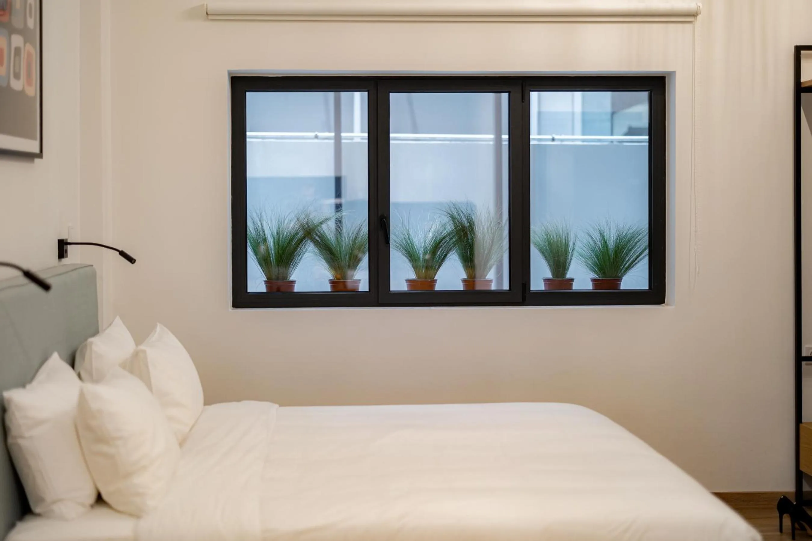 Bed in Earos Urban Living