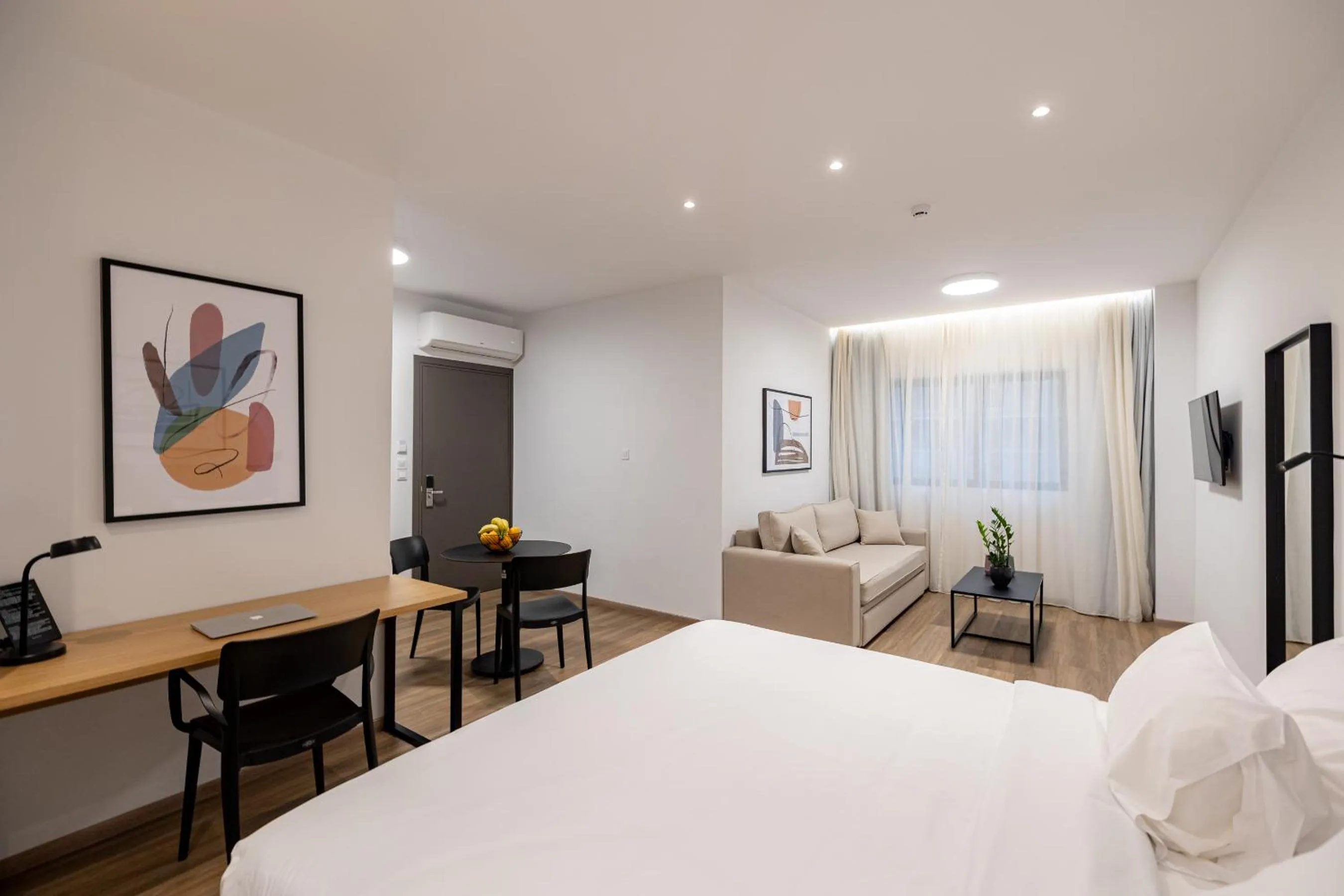 Photo of the whole room, Bed in Earos Urban Living