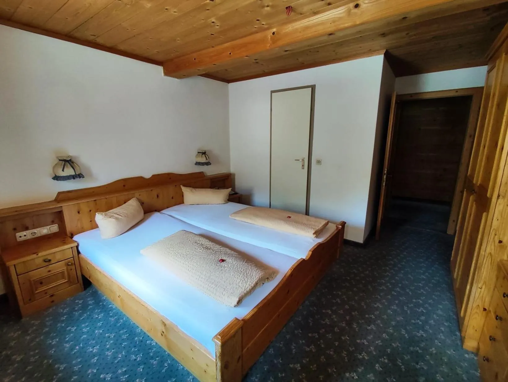 Photo of the whole room, Bed in Gasthaus Mitterjager