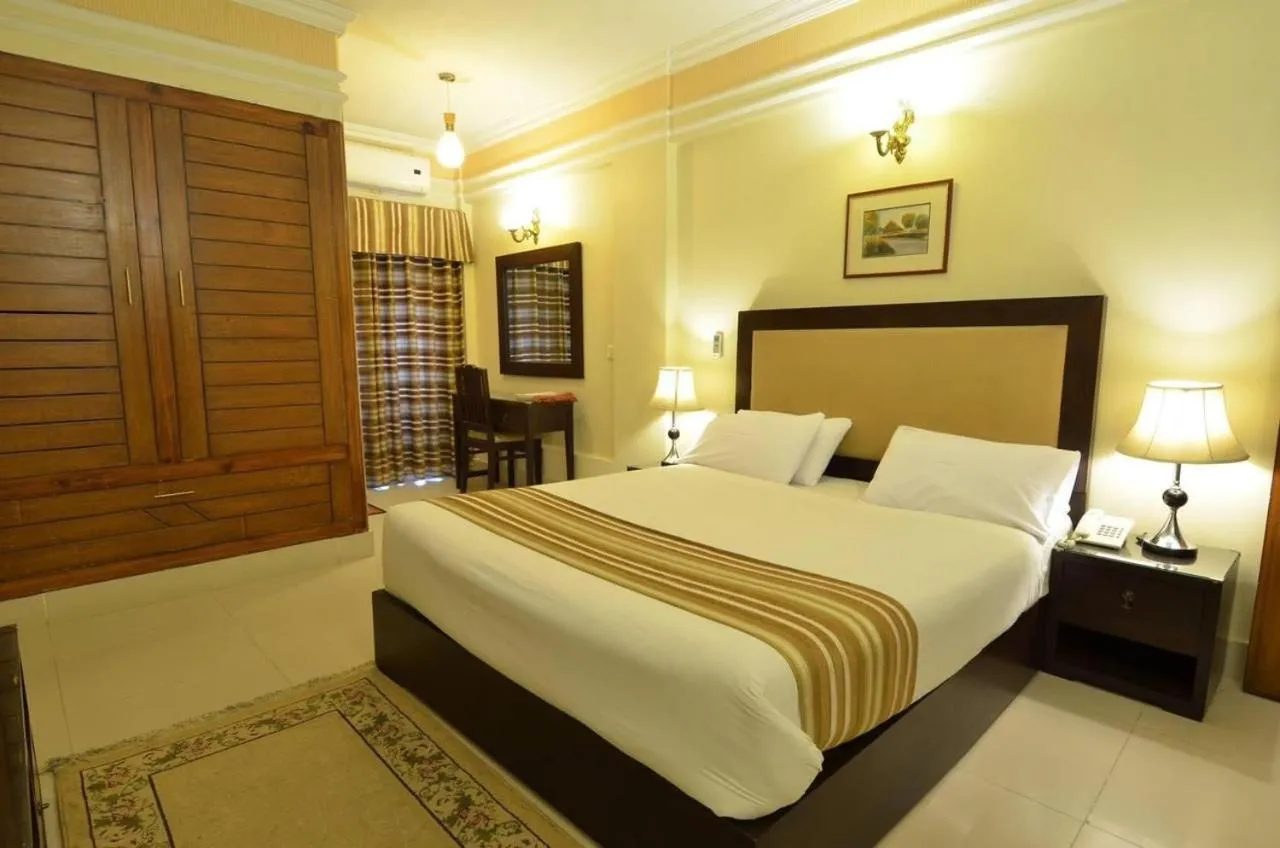 Bed in Pak Continental Hotel