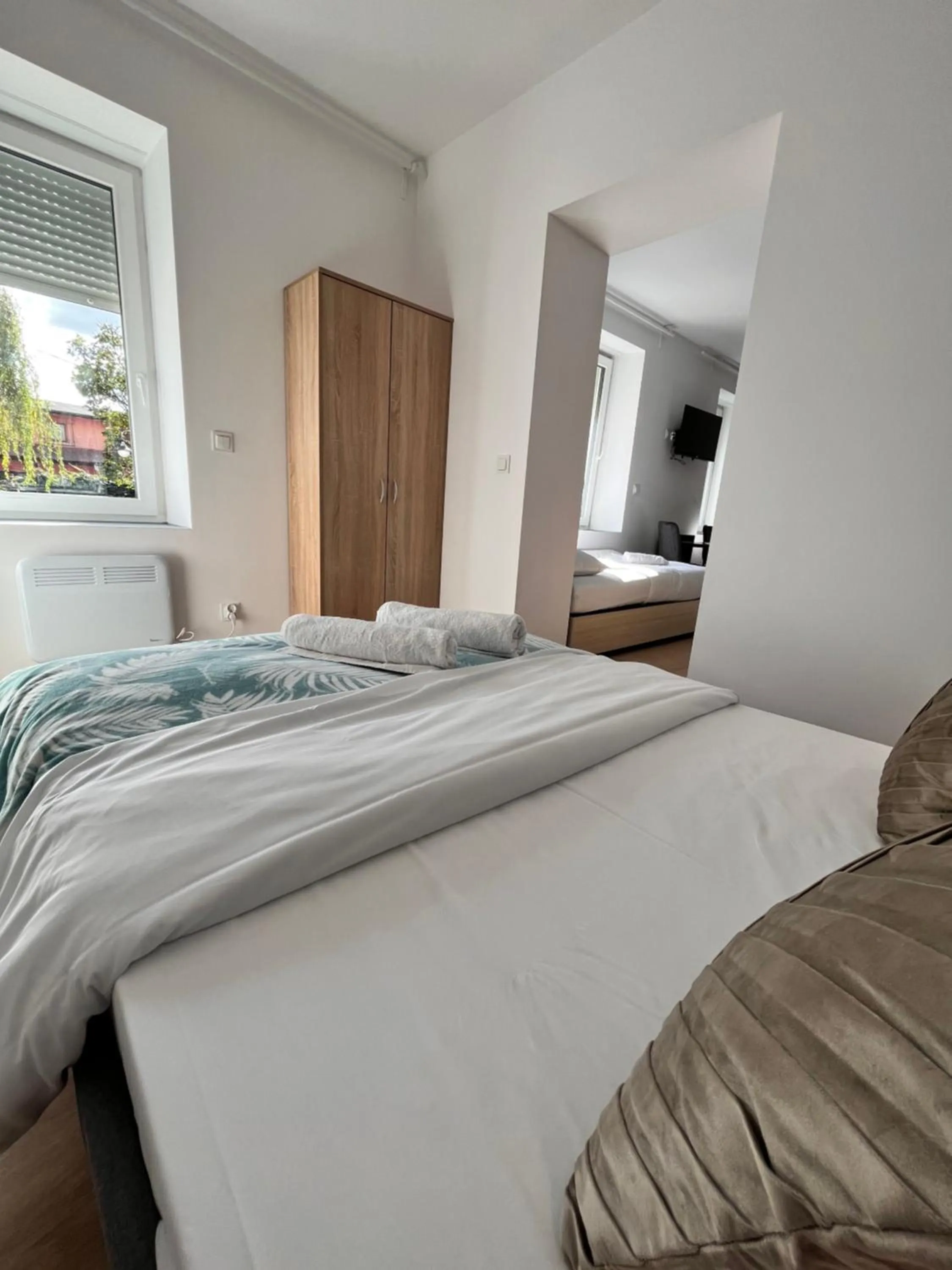 Bed in 3 Budget Stay Apartments