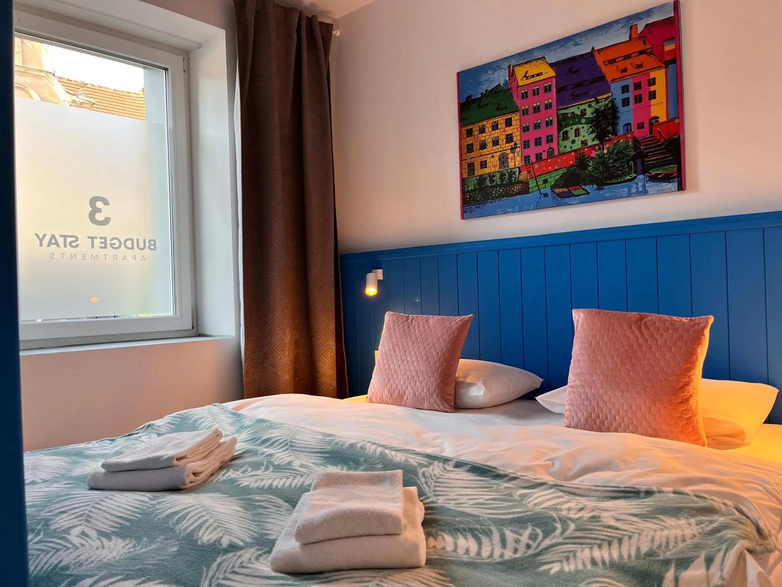 Bed in 3 Budget Stay Apartments