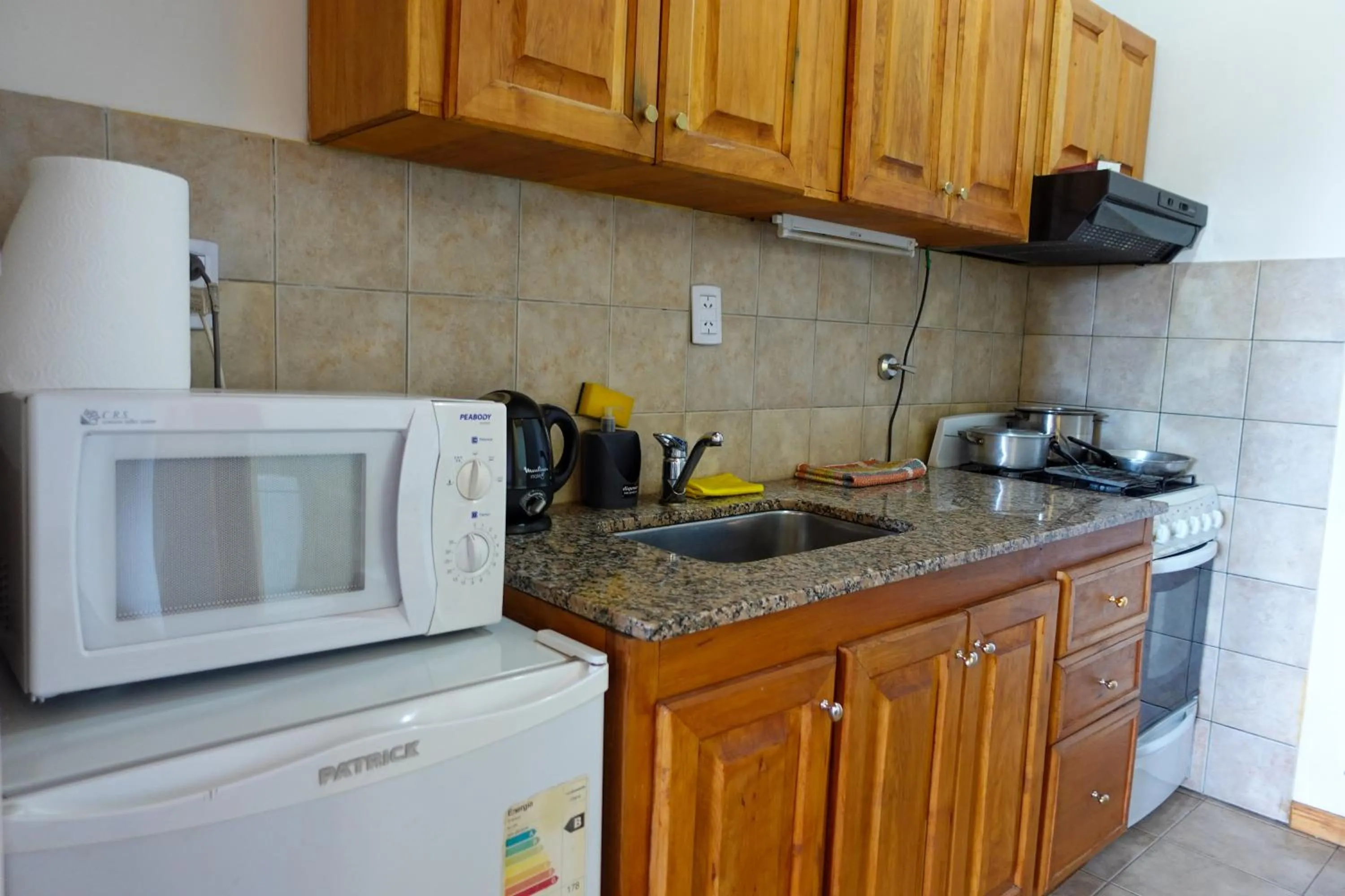 kitchen in Choconcito Apart Hotel