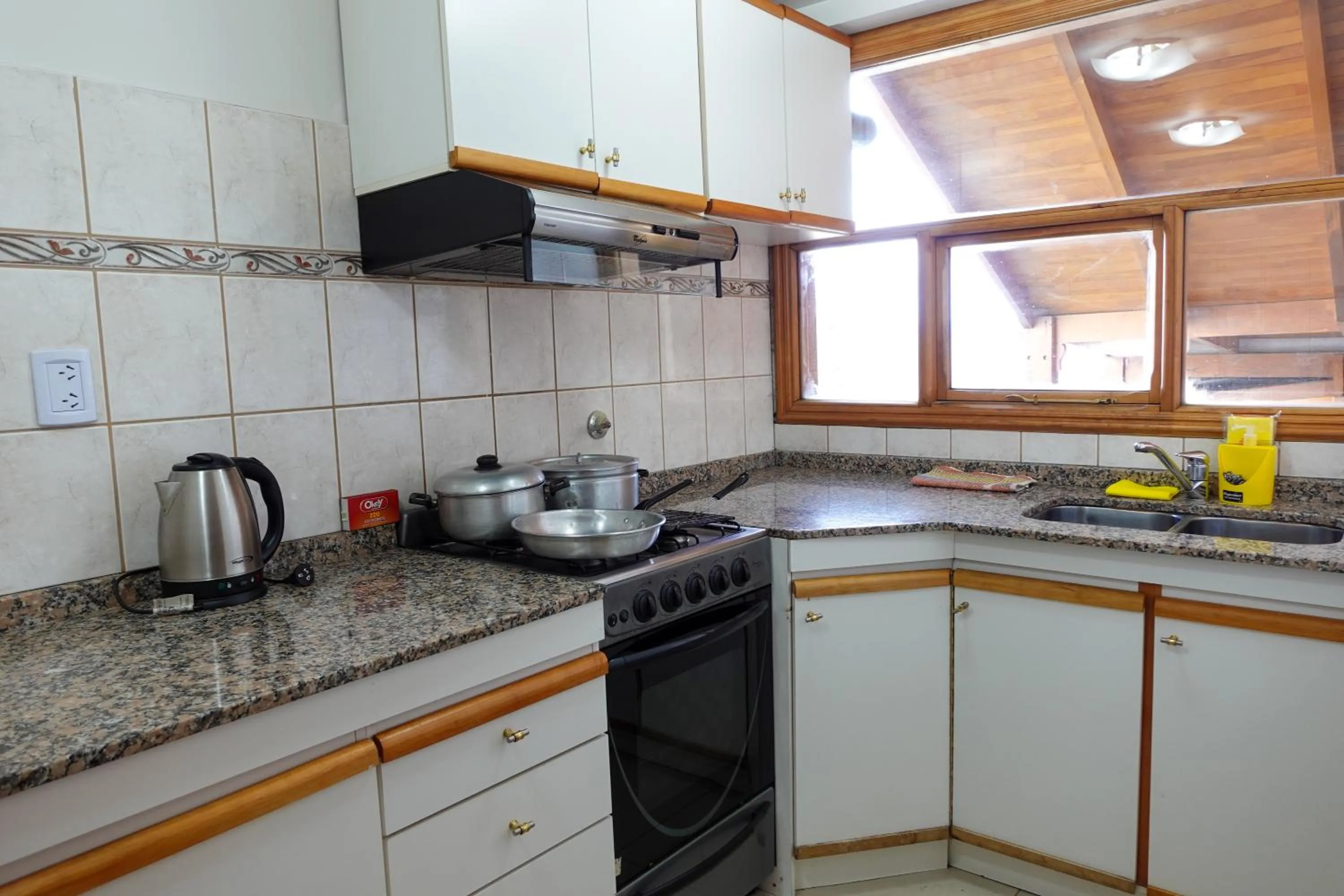 Kitchen or kitchenette in Choconcito Apart Hotel