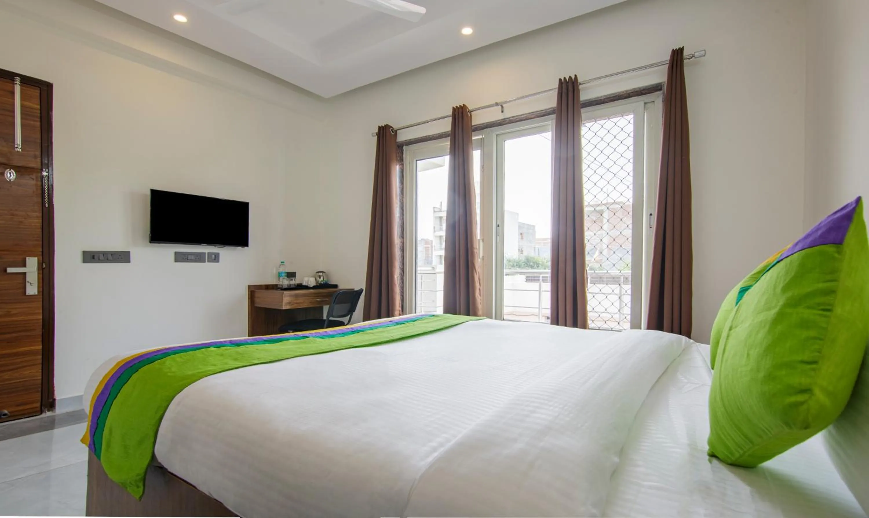 Bedroom, Bed in Treebo Grand Vista - 62