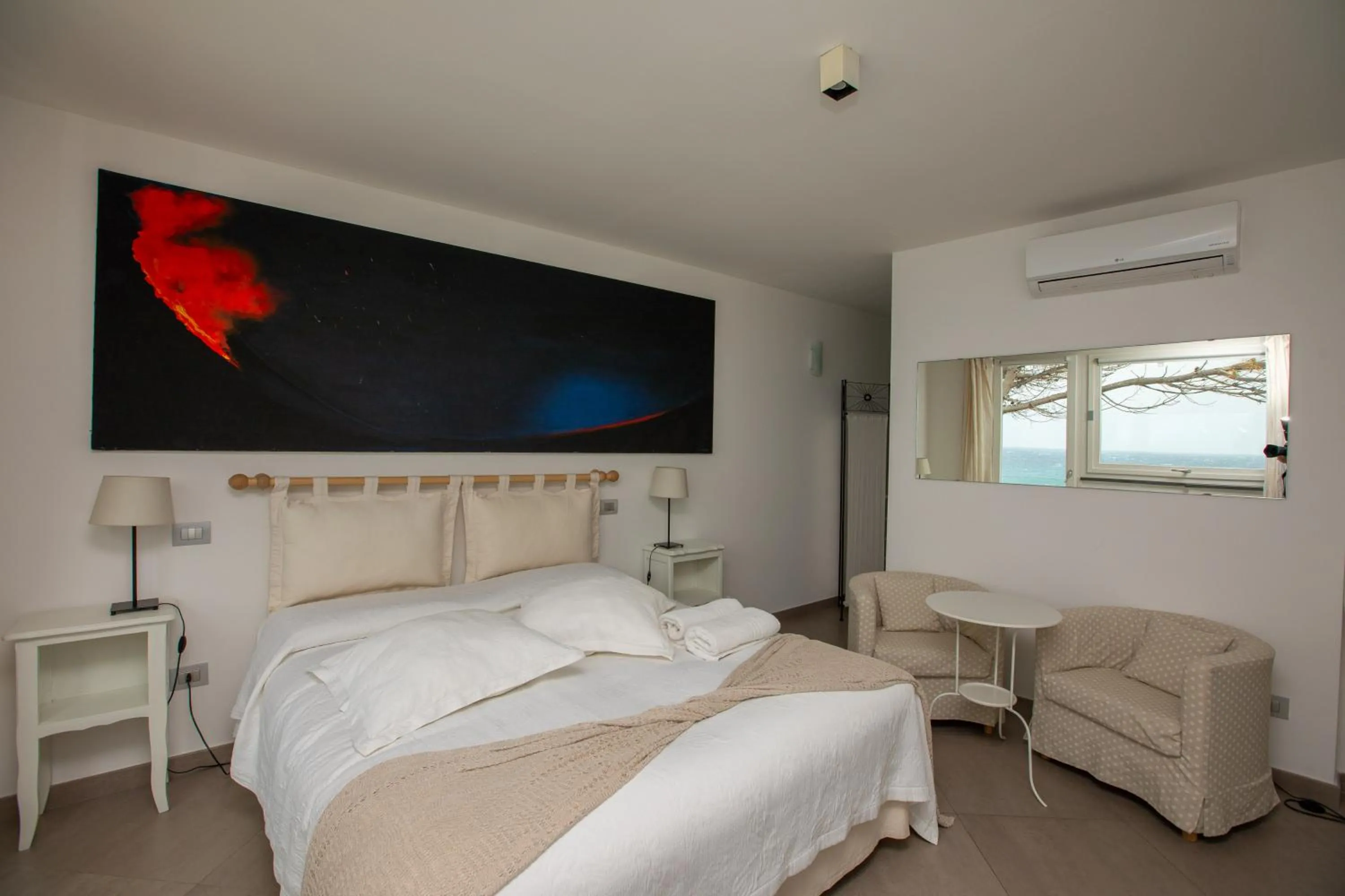 Bed in Il Gabbiano Relais in Stromboli