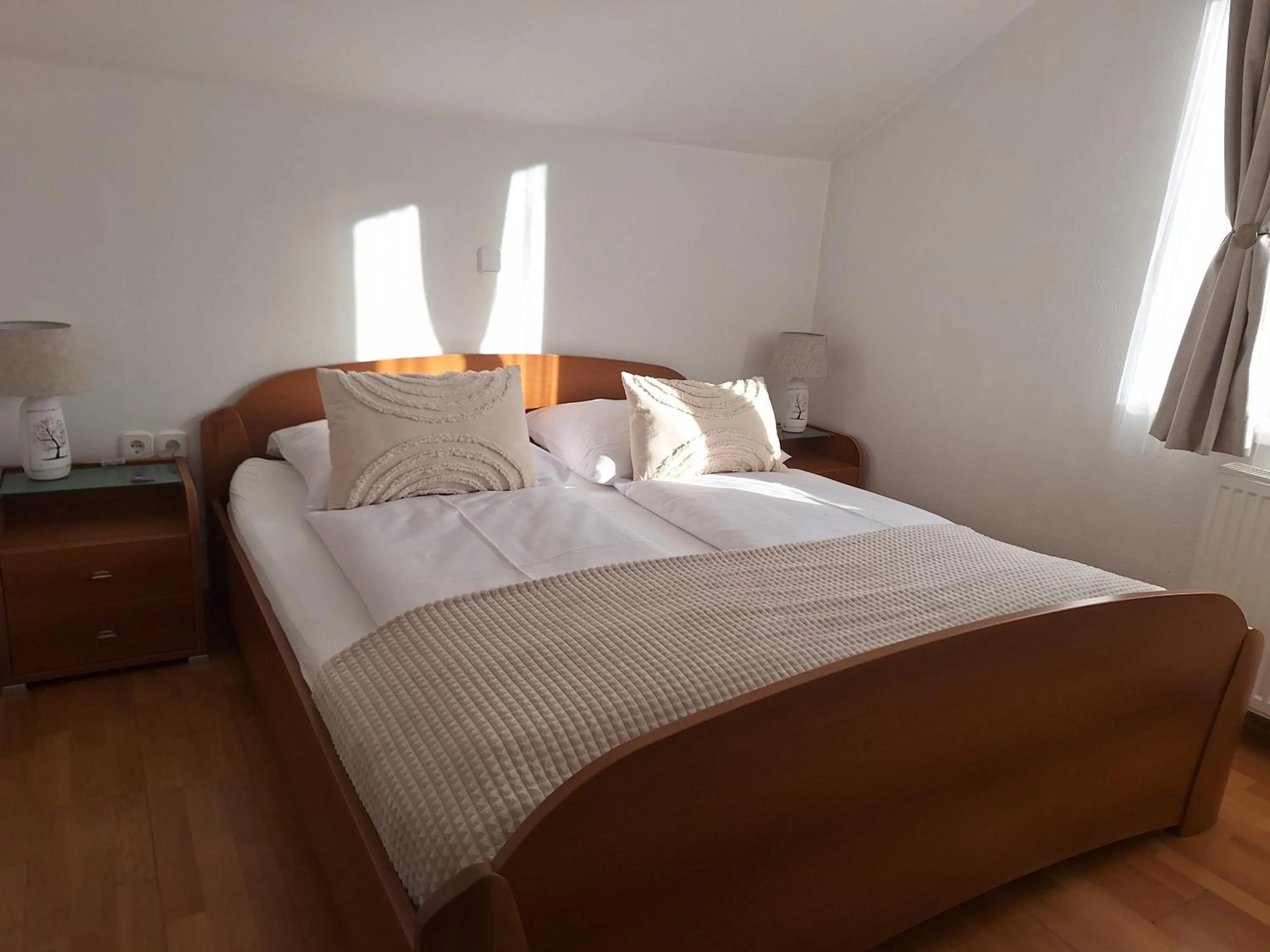 Bed in Apartments Mertelj
