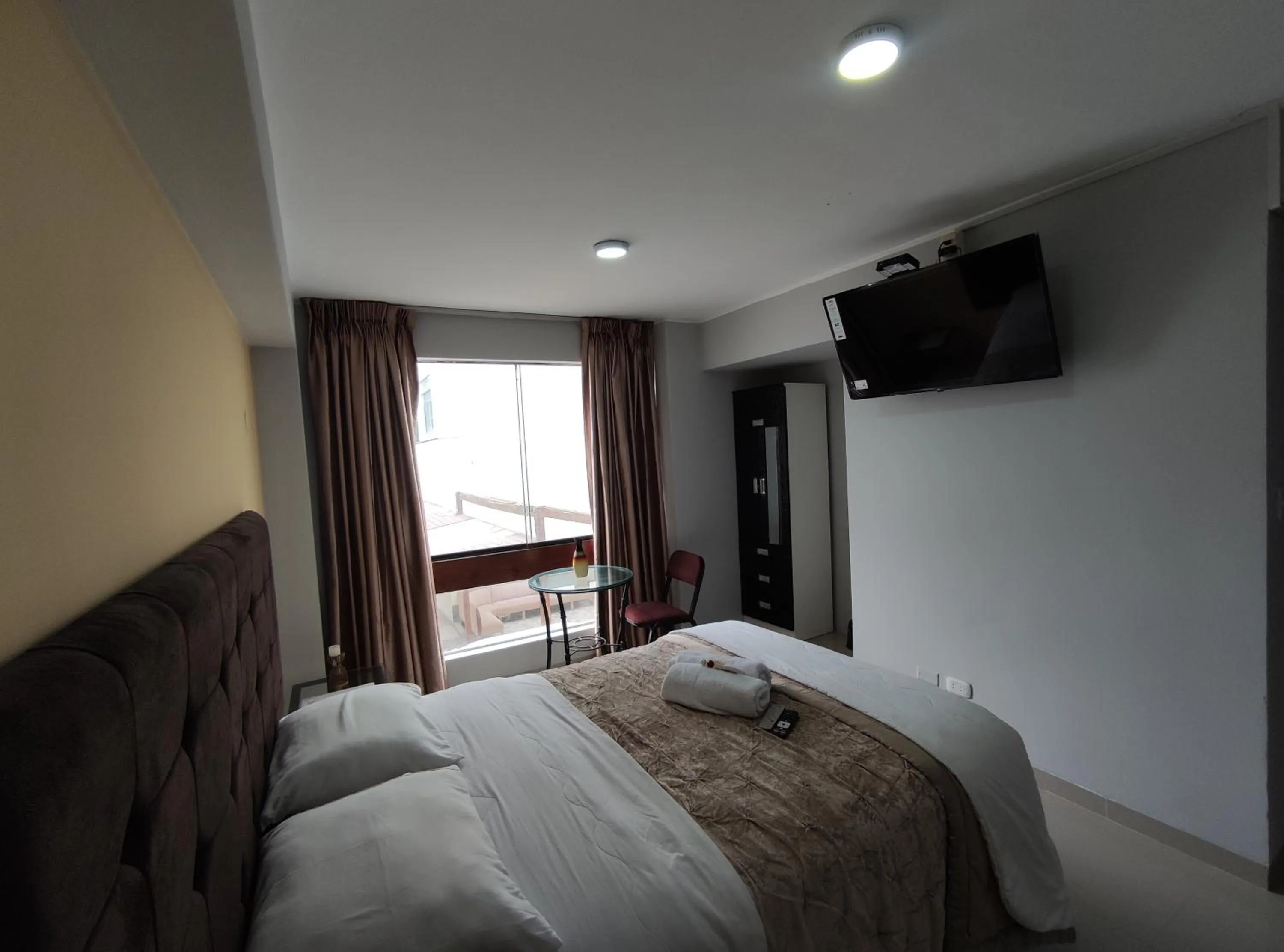 Photo of the whole room, Bed in Inti Llaqta Hotel & Suites