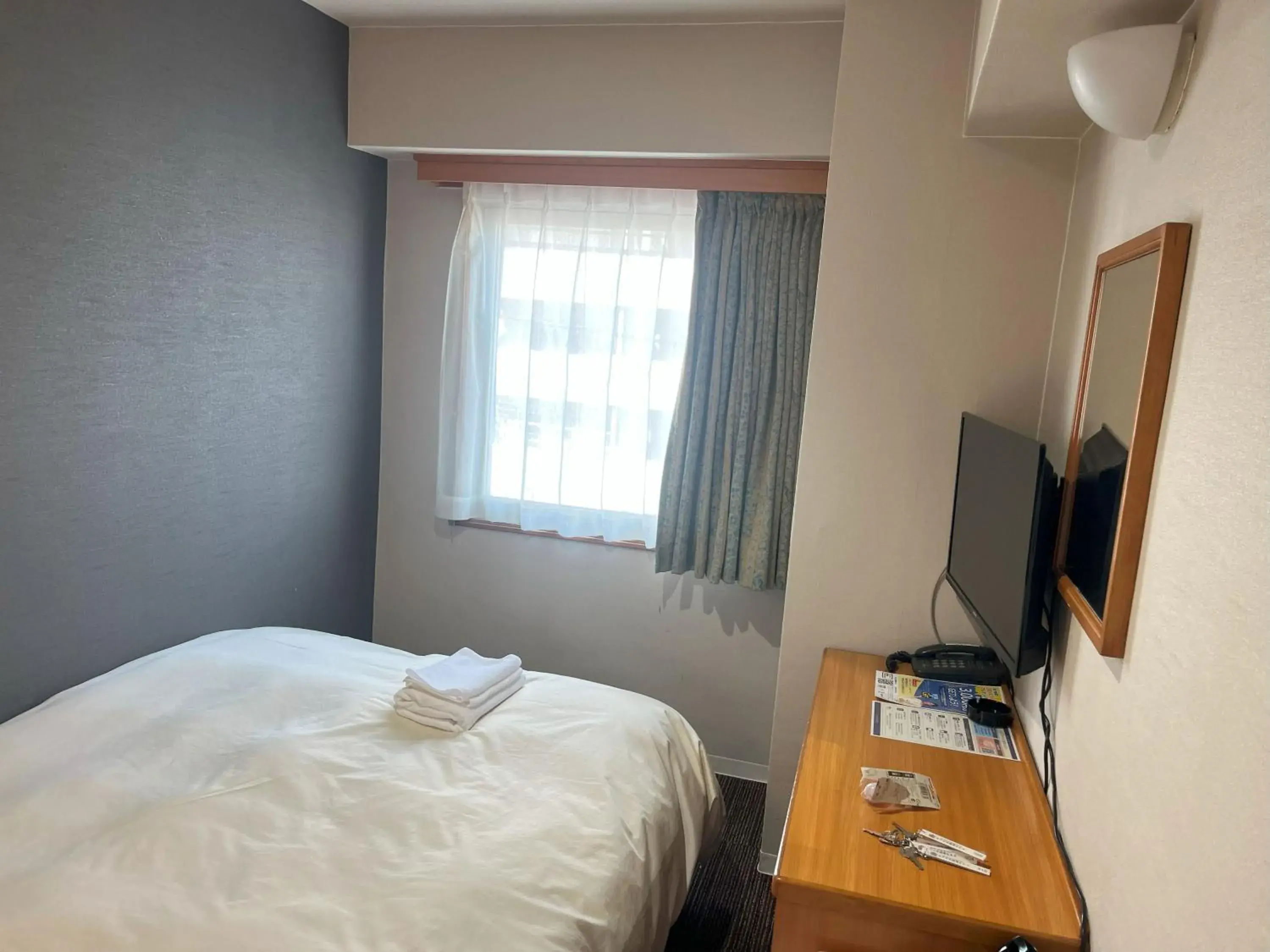 Bed in Hotel Kurume HIlls Bed in Hotel Kurume HIlls