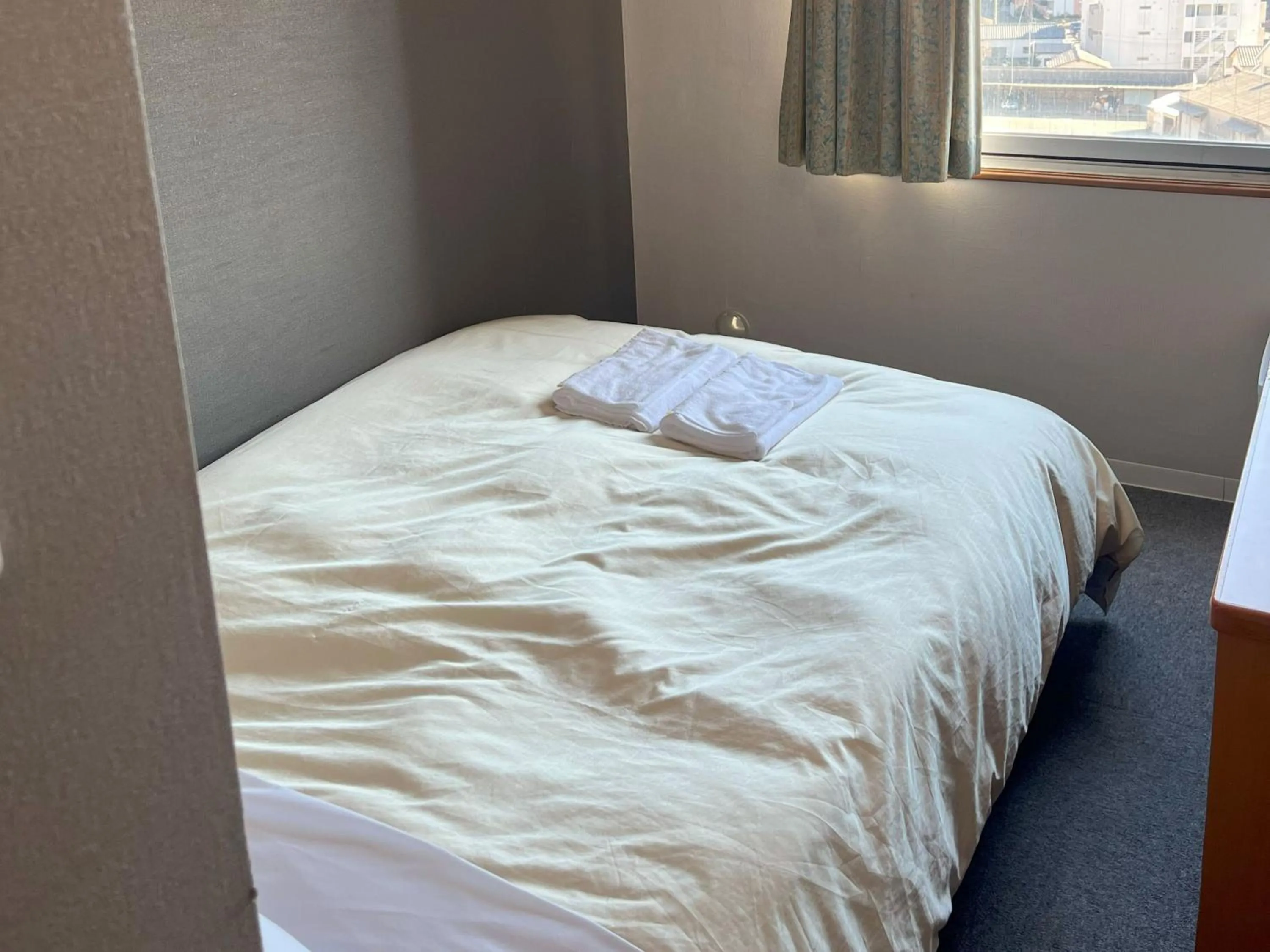 Bed in Hotel Kurume HIlls