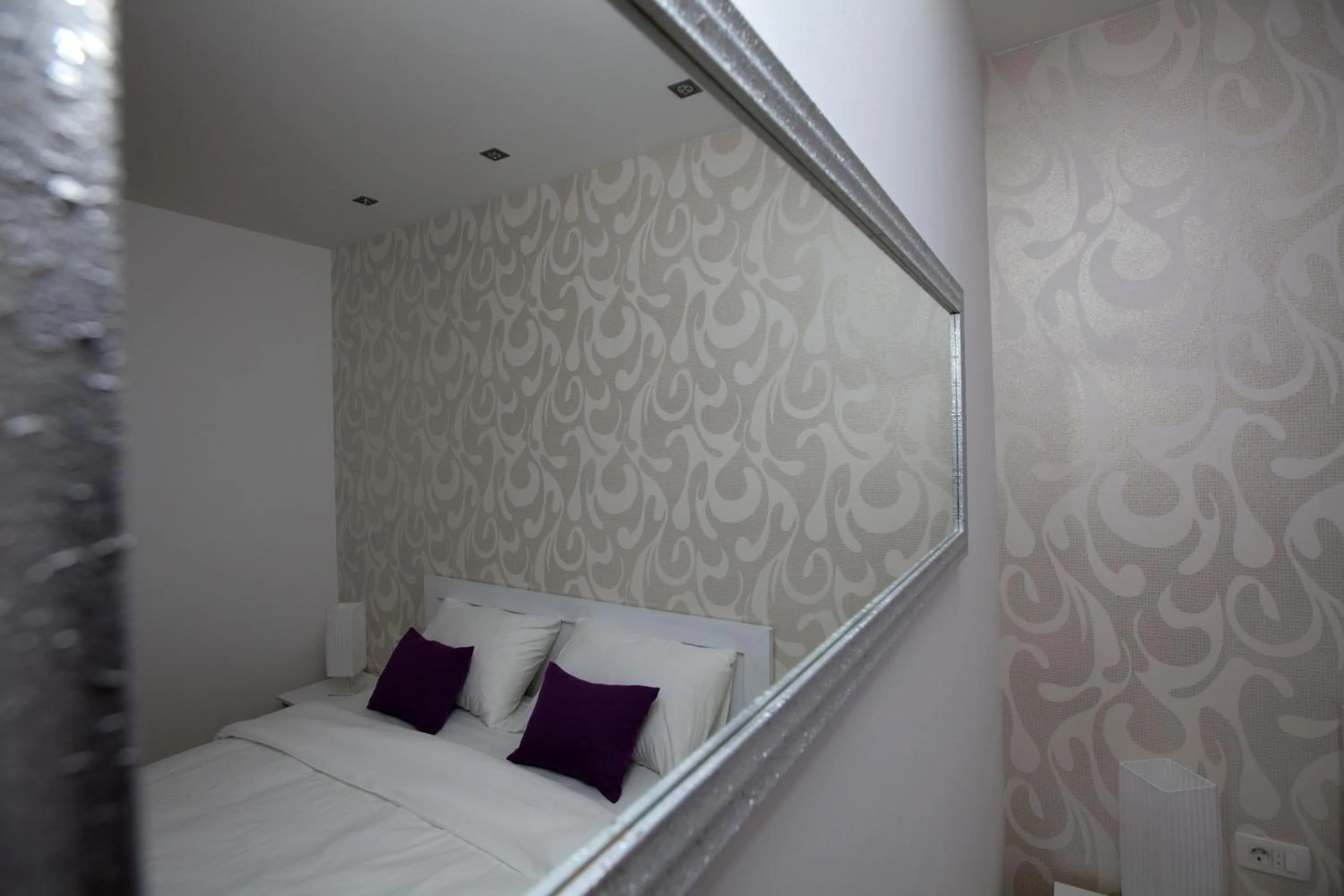 Bed in Rooms Ino