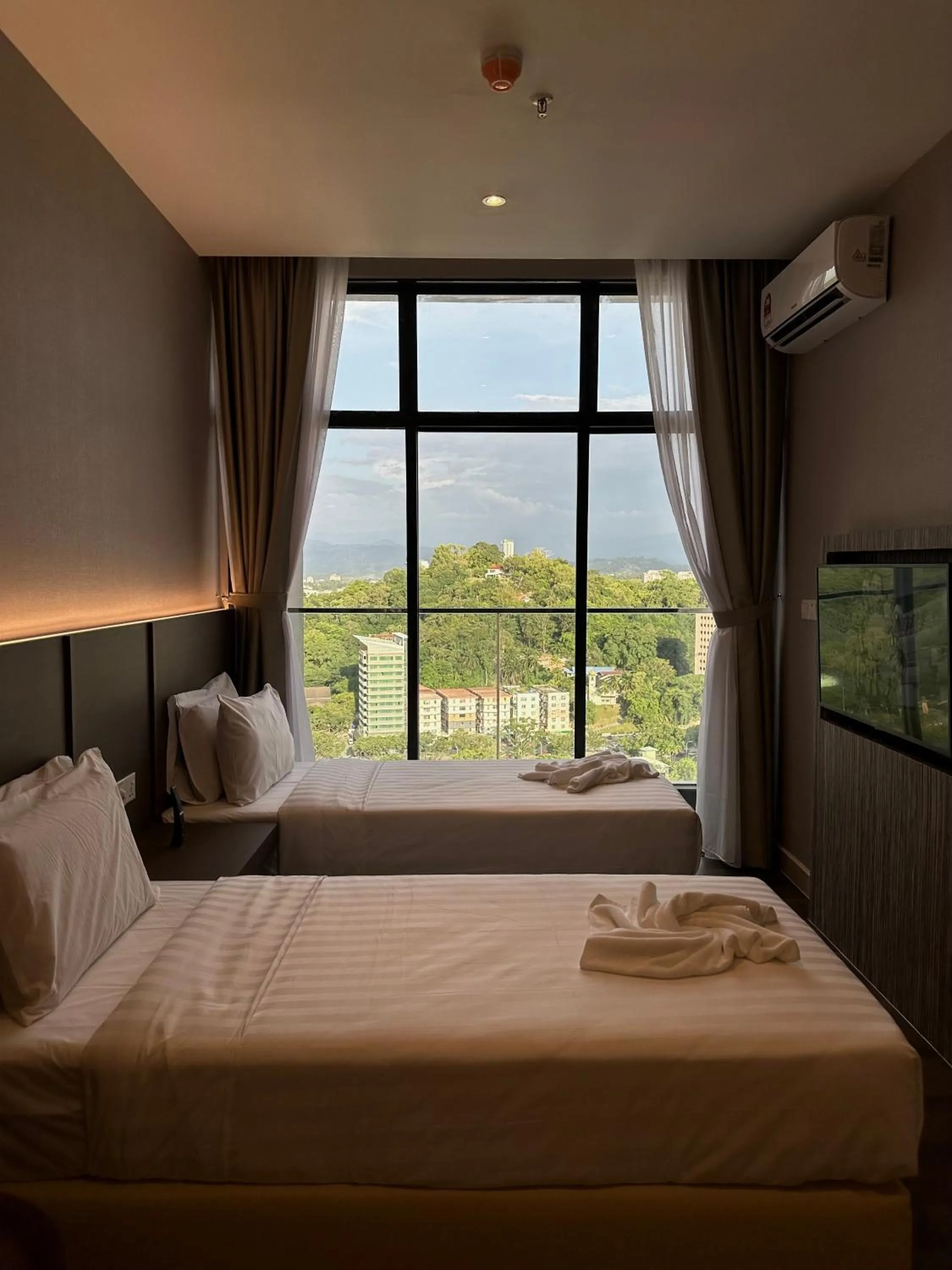 Photo of the whole room, Bed in Borneotel The Shore KK by CHG