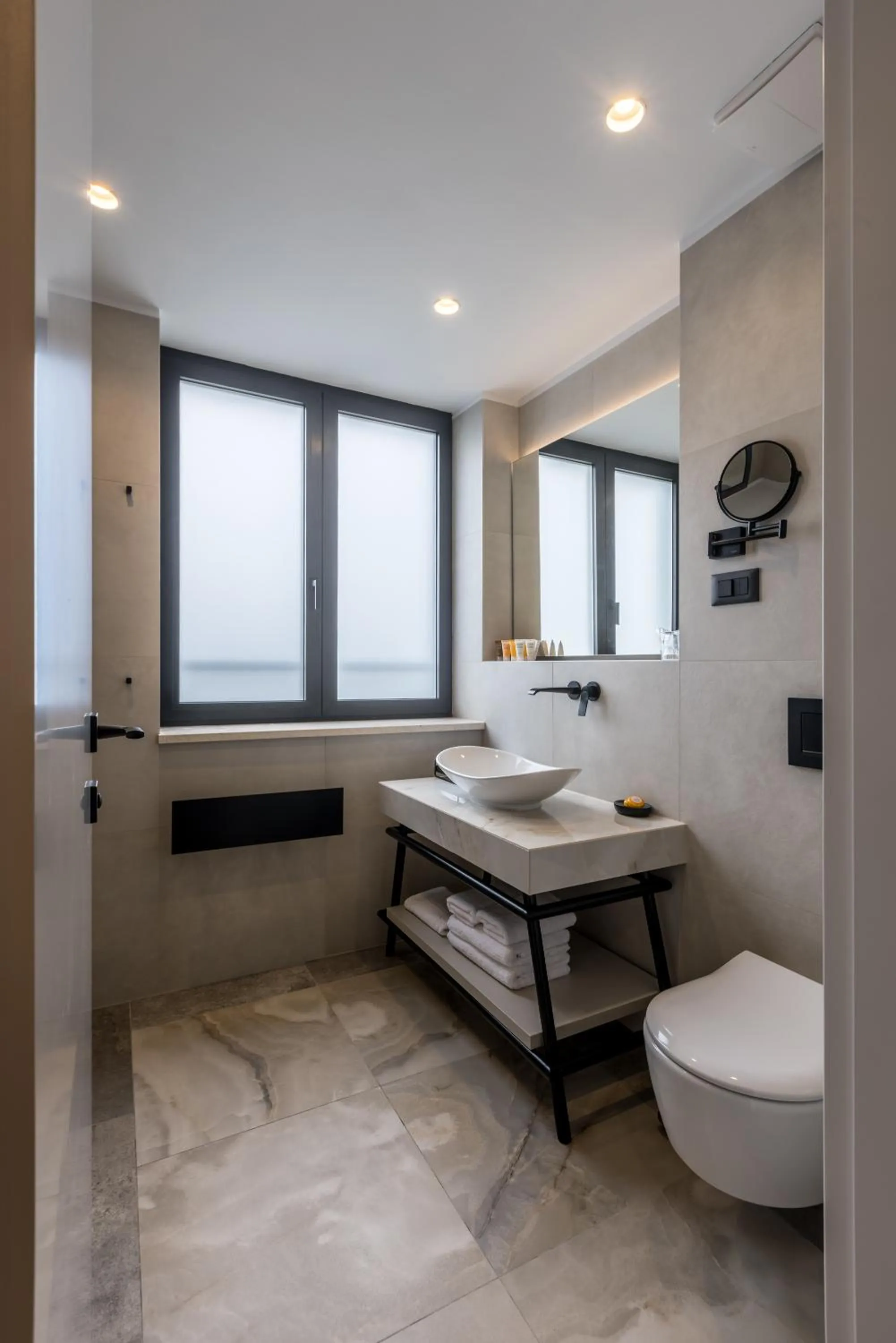 Toilet in Cora Hotel