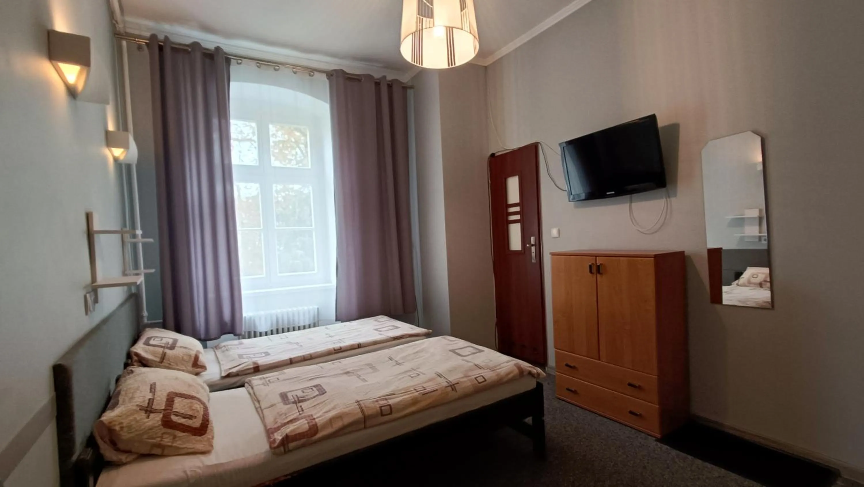 Bed in Hotel Polonia